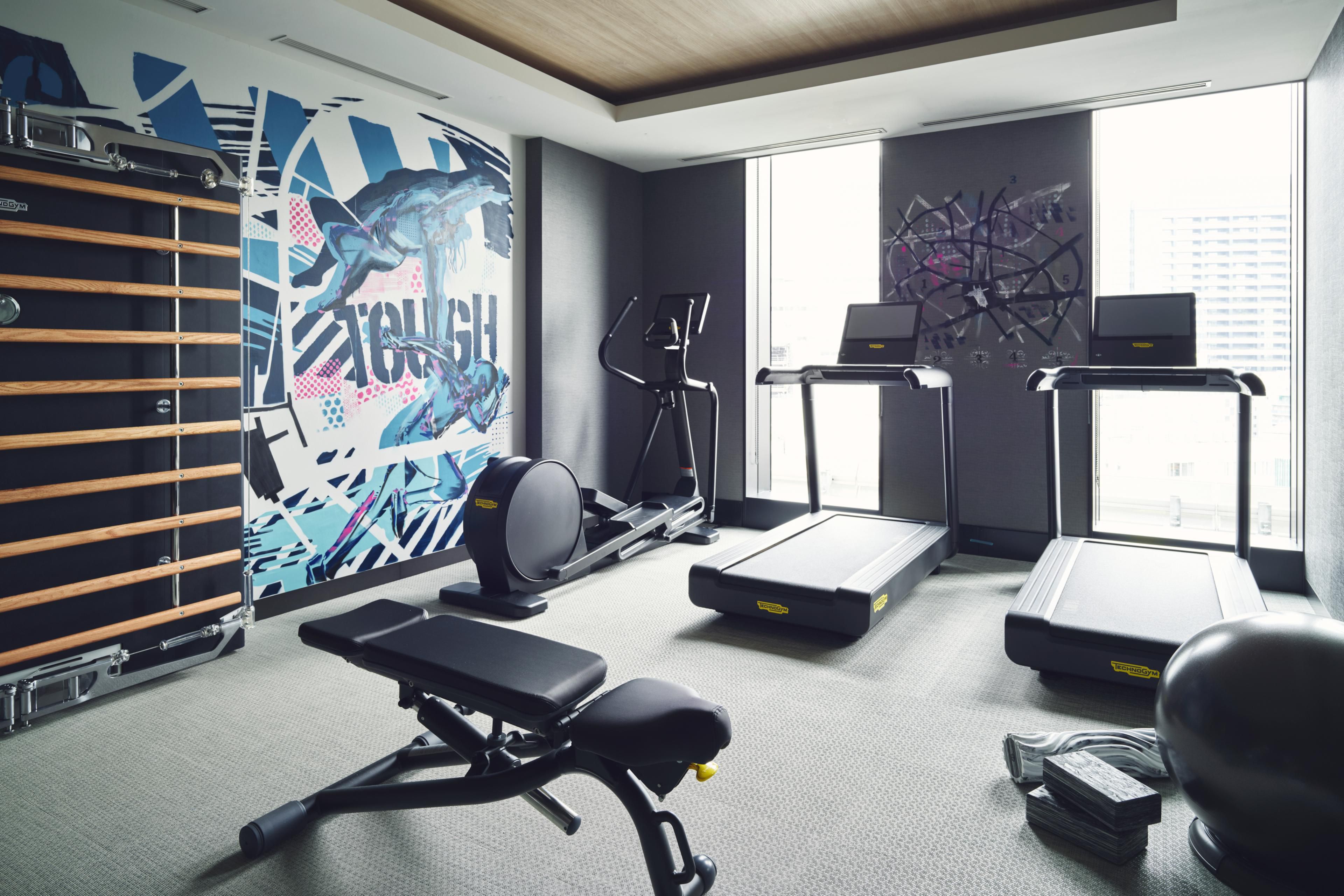 We offer the latest fitness machines to enjoy your own lifestyle during your stay.
The machines are equipped with Technogym equipment, which is used by top athletes and celebrities around the world for its sophisticated design and high technology. The wall artwork, which is designed to help you enjoy your workout will lead you to energetic space.