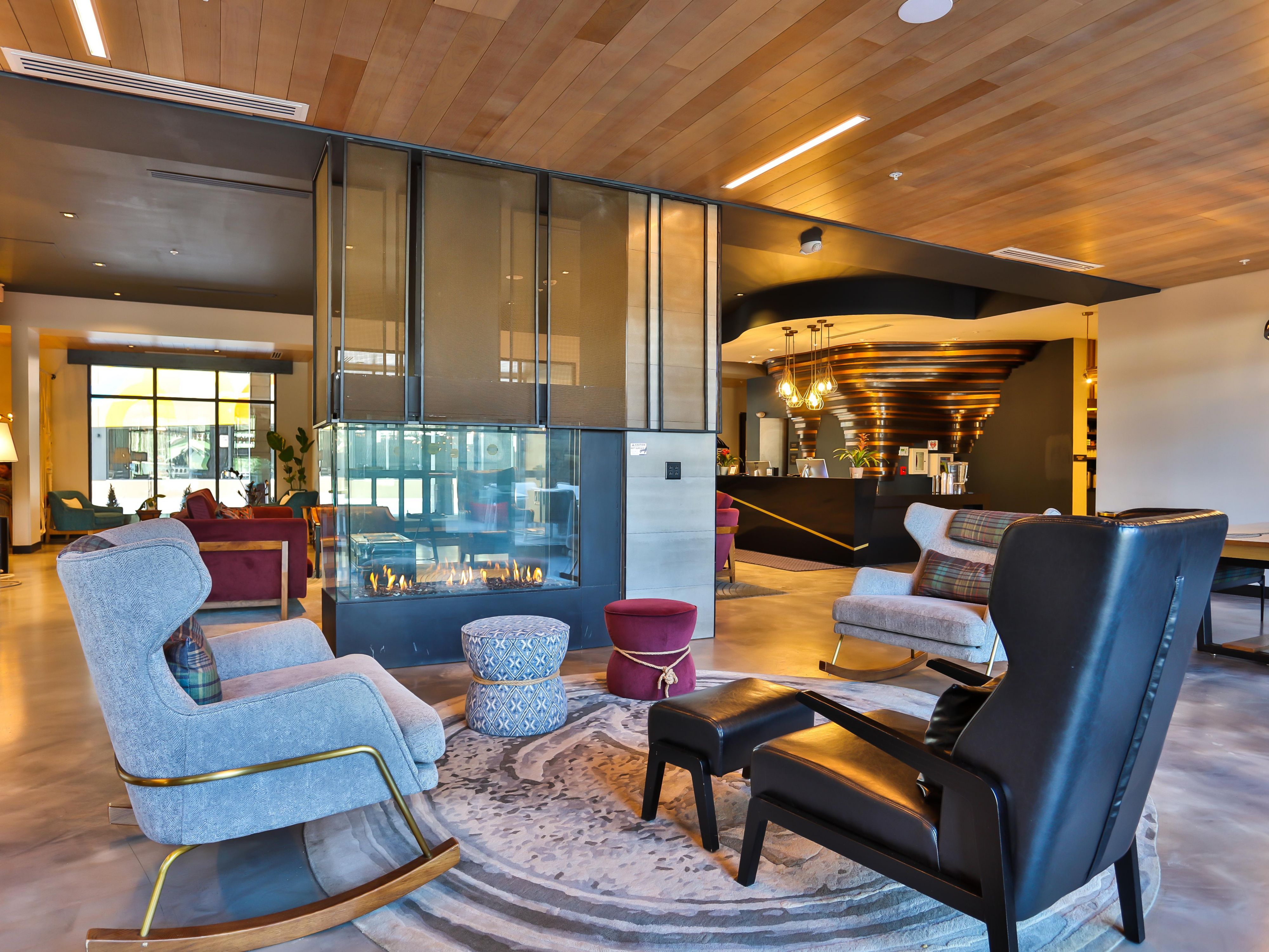 Take the Colorado chill off next to our lobby fireplace