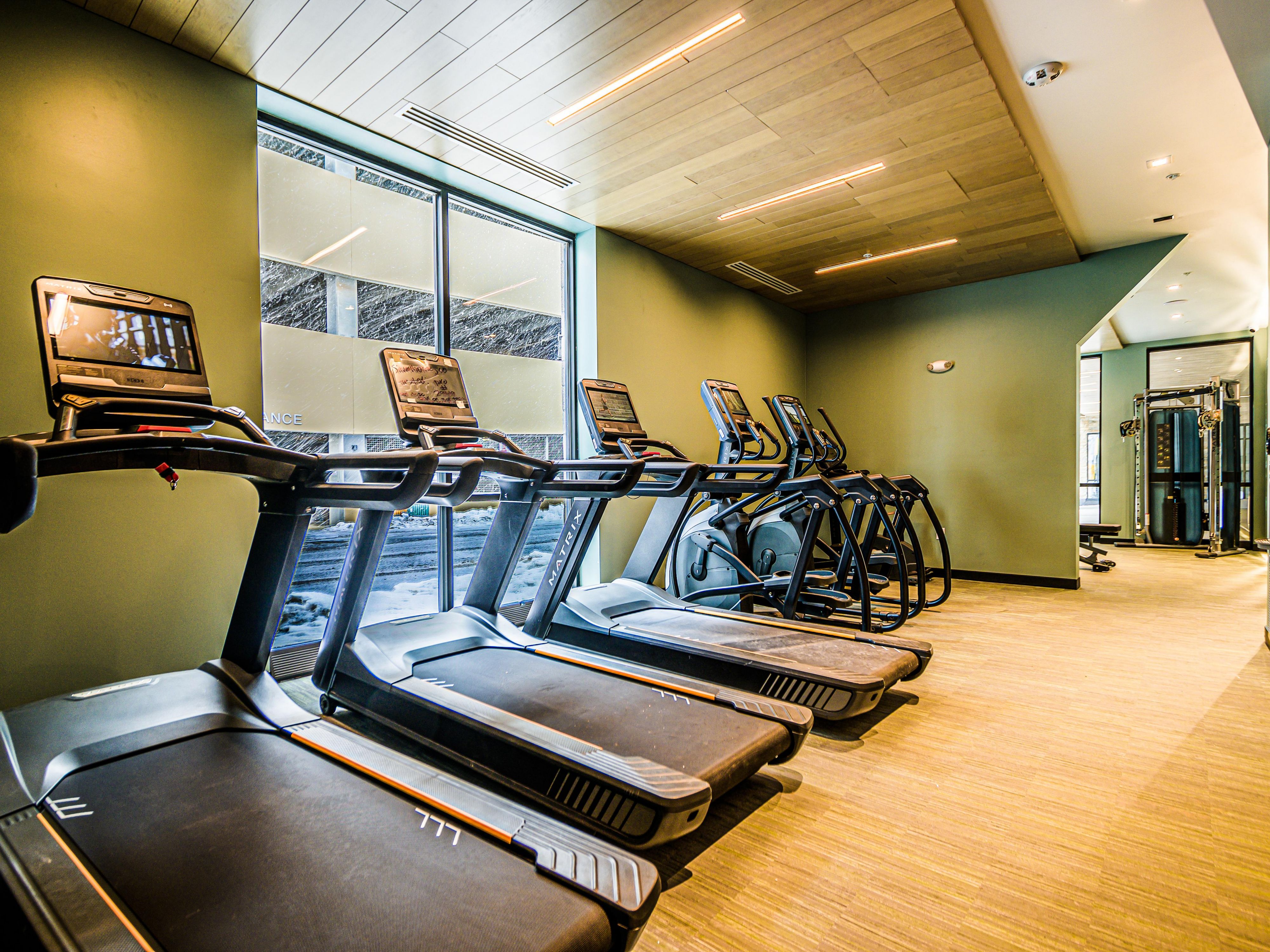 24/7 fitness center w top of line equipment. Don't miss a workout.