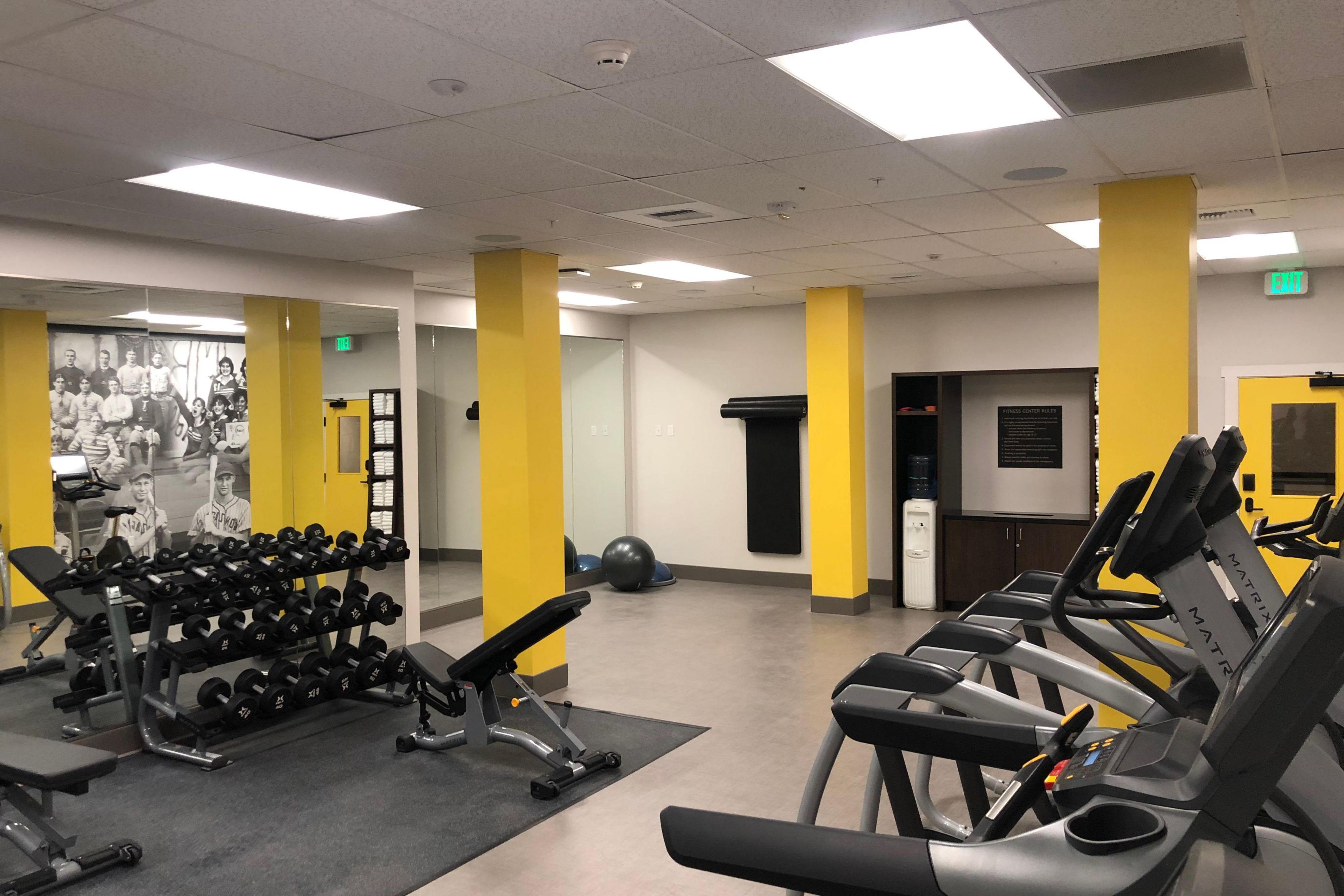 Stay committed to your fitness routine with our round-the-clock fitness center. Our well-equipped facility features everything you need, from treadmills and ellipticals to free weights and balance balls. Enjoy complimentary water and fresh towels for a hassle-free fitness experience.