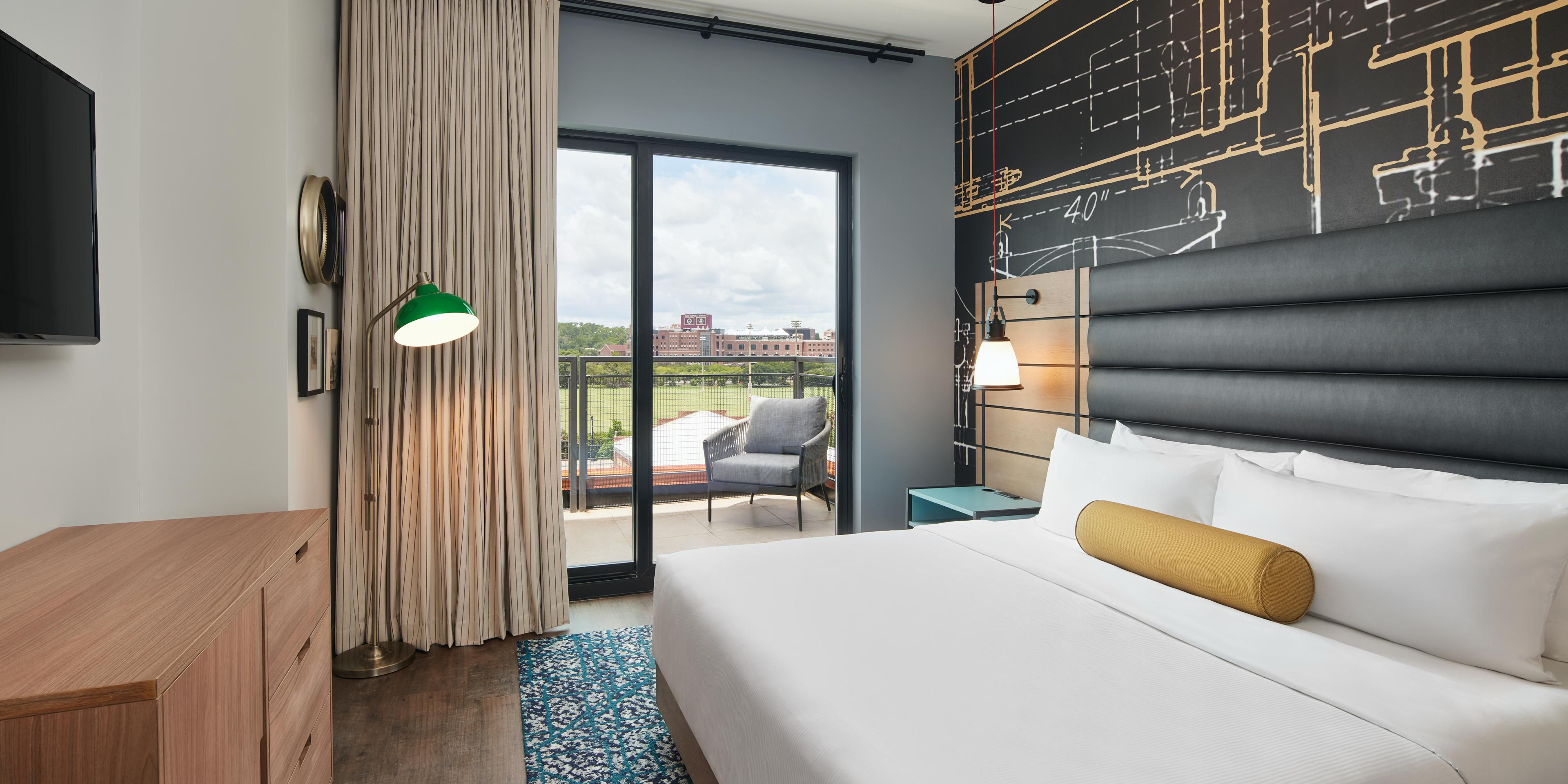 King bed suite with balcony view overlooking FSU stadium & campus.