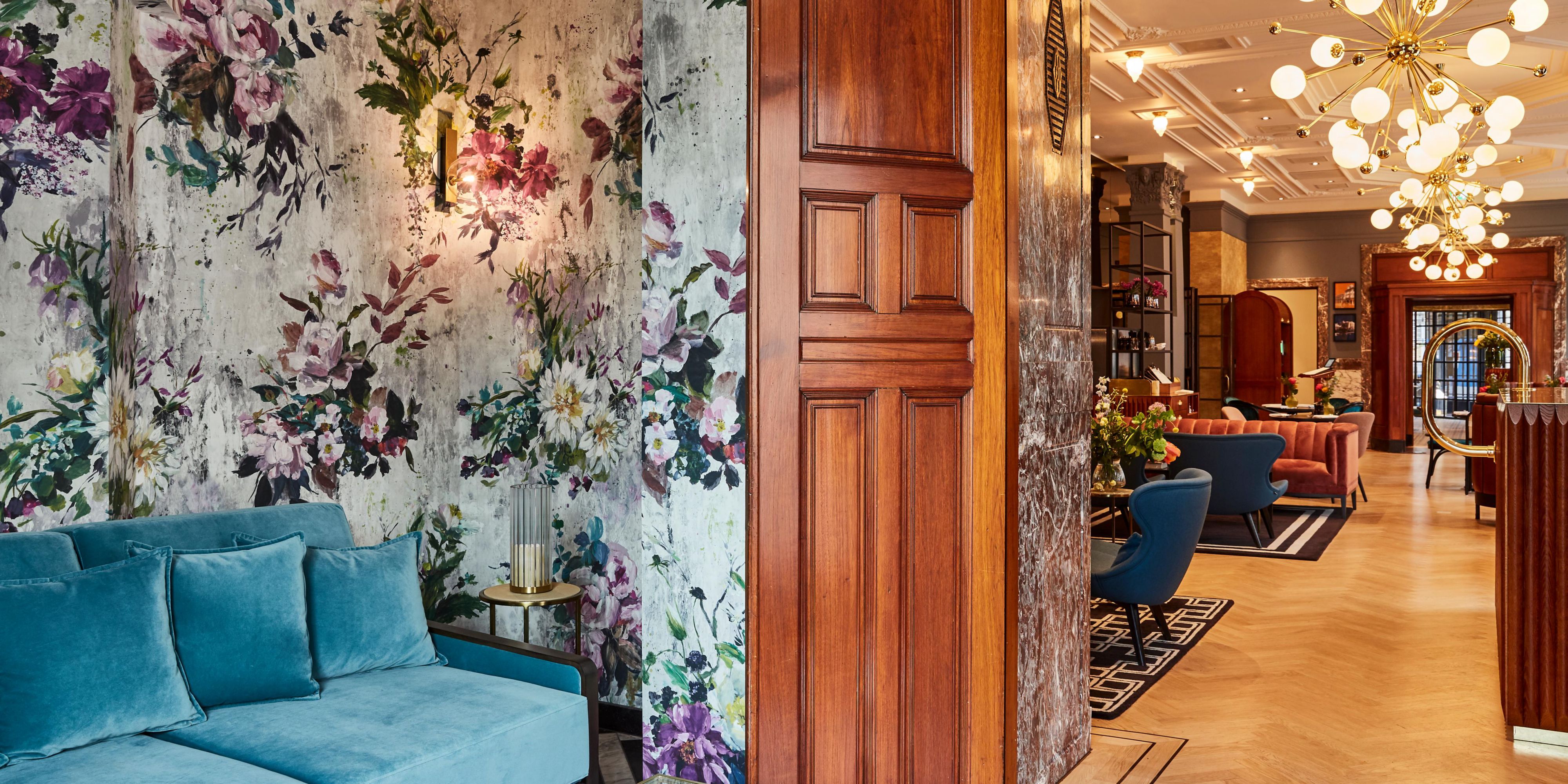 Floral wallpaper references the classic Dutch tulips