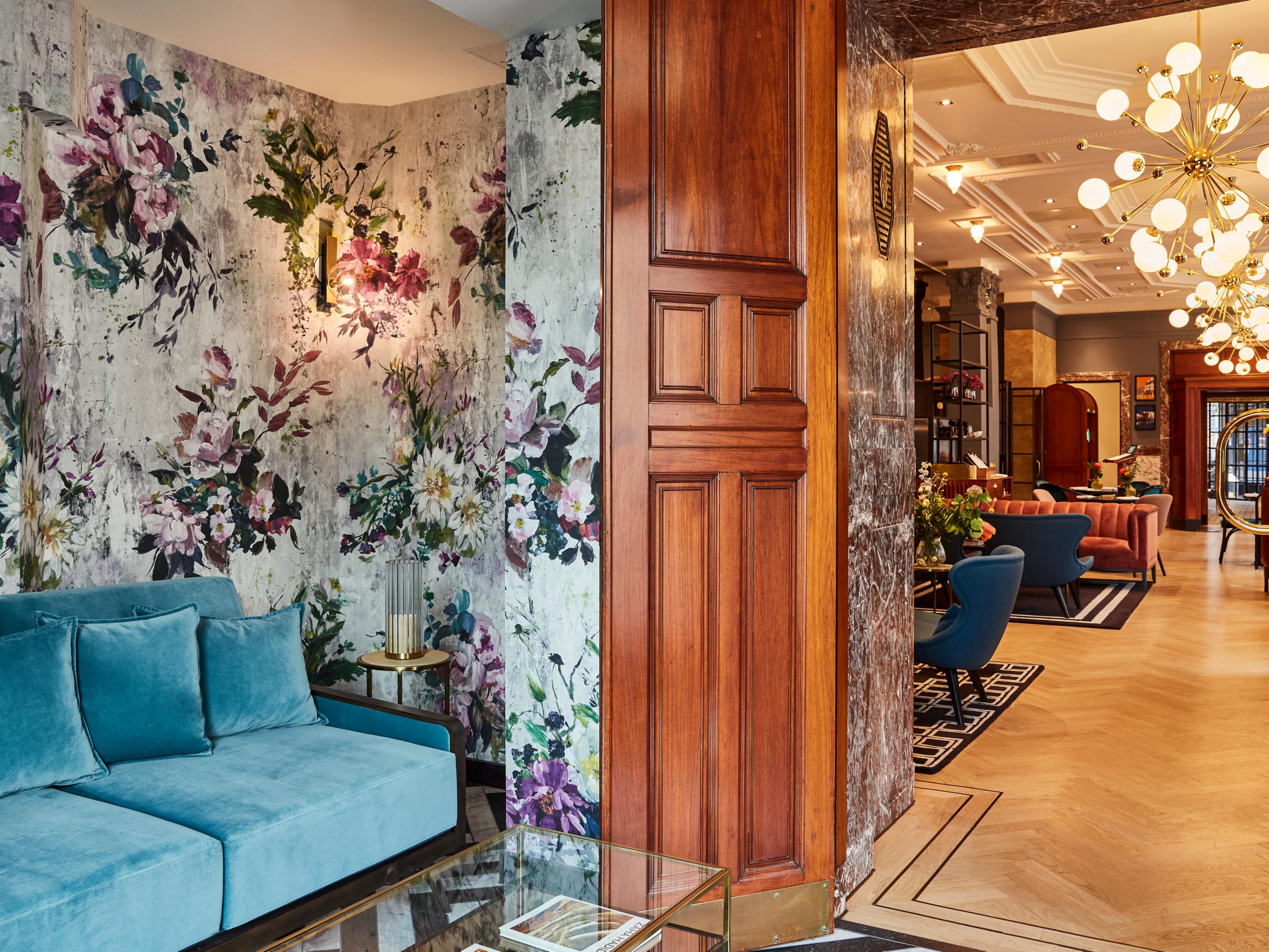 Floral wallpaper references the classic Dutch tulips
