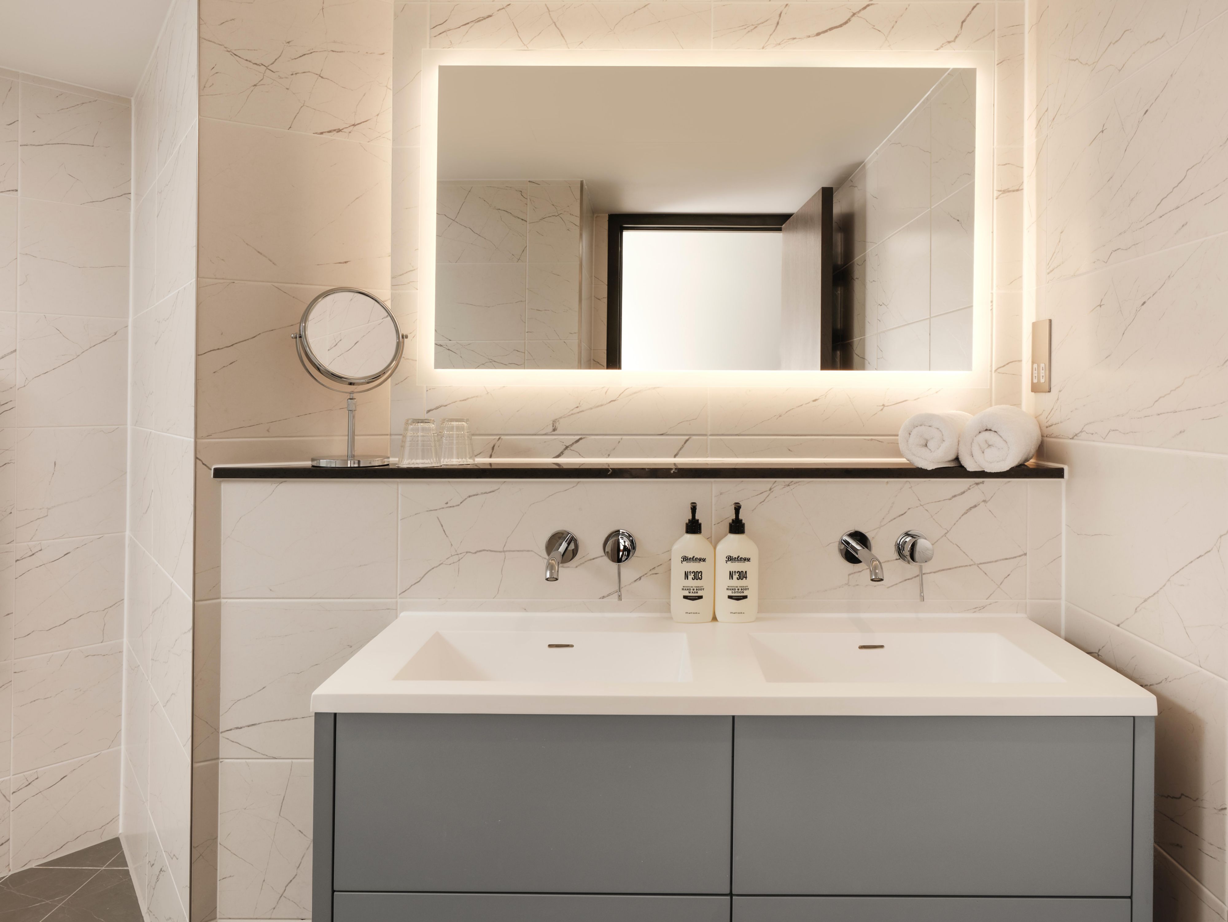 Explore our modern bathroom with coastal-inspired design touches.