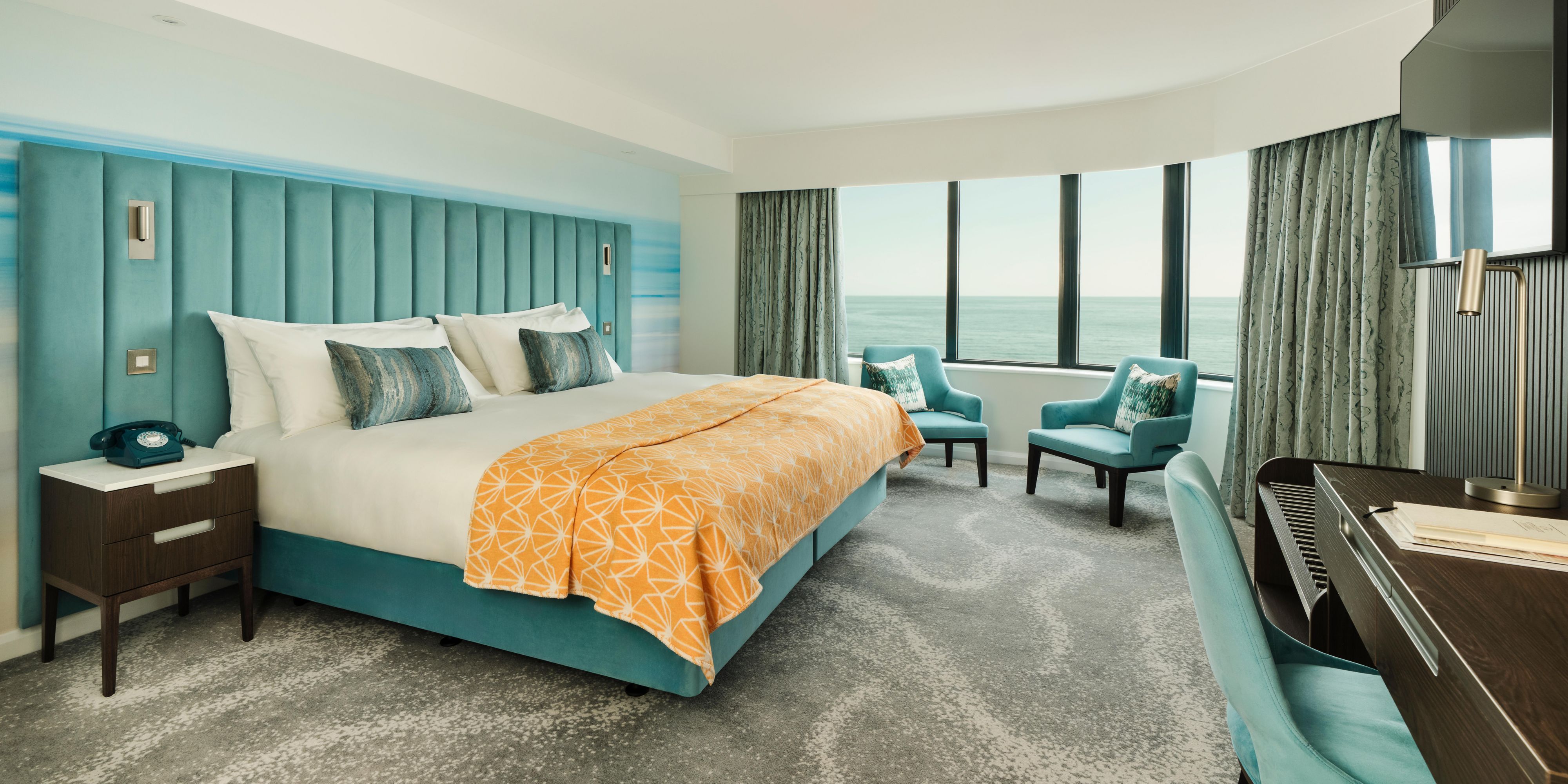 Enjoy a boutique stay with subtle blue accents and coastal charm.