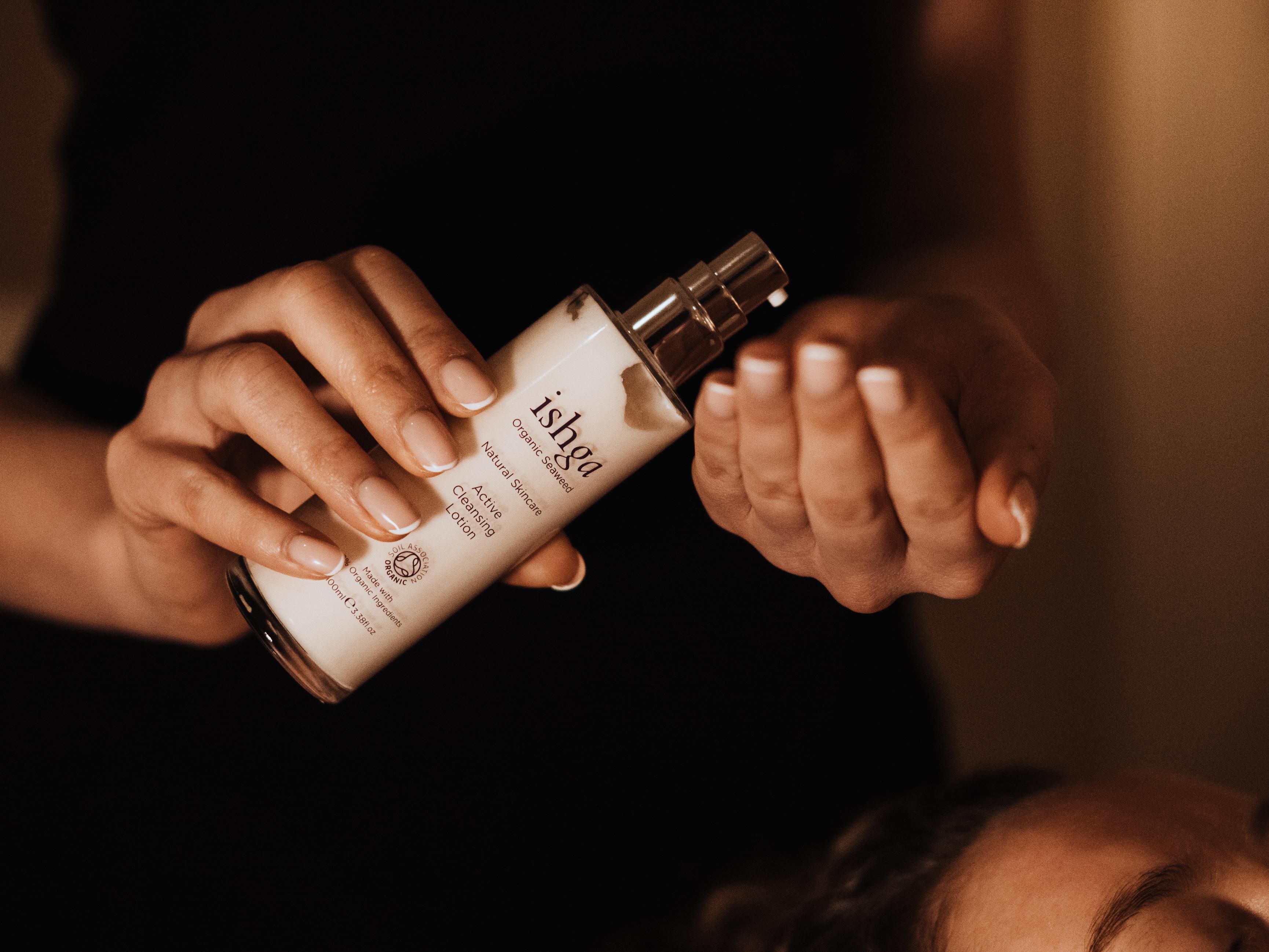 Spa therapist preparing luxury wellness treatment