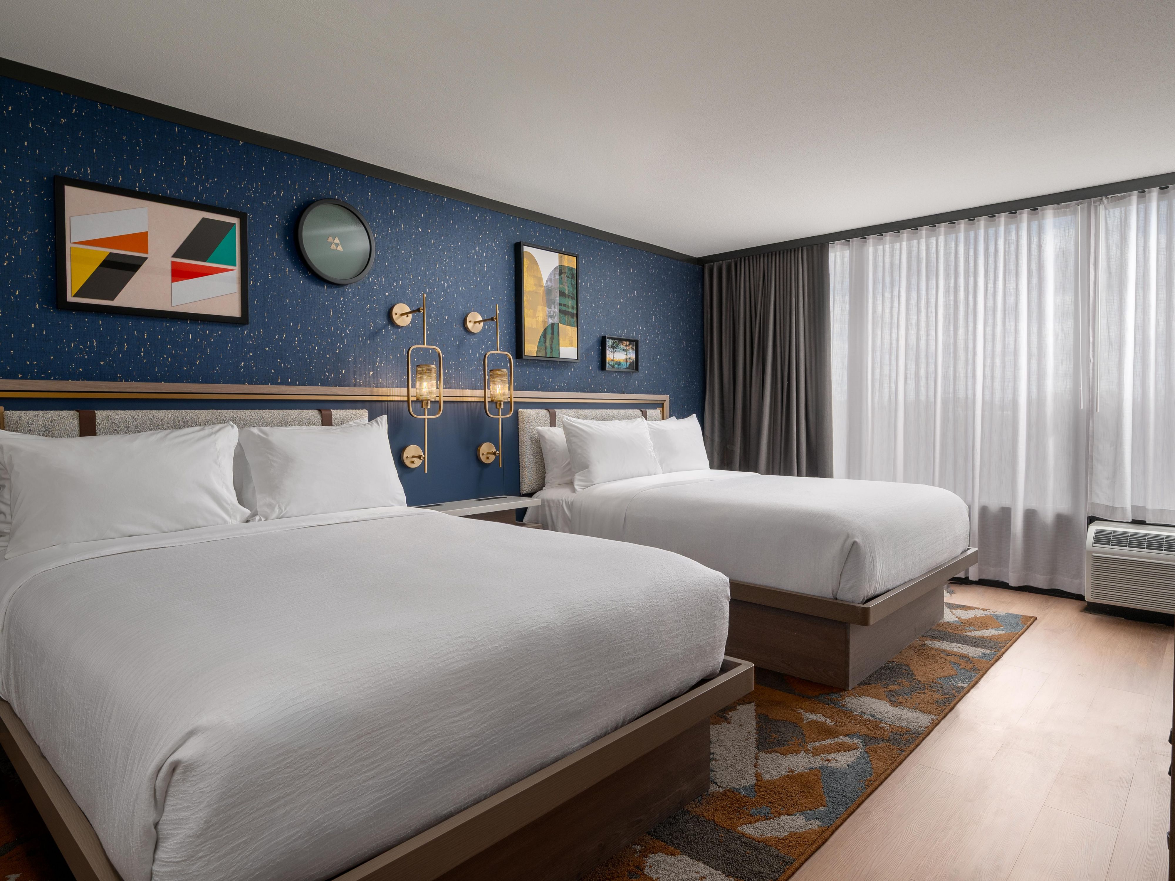 With 19 suites and spacious guest rooms, each featuring large bathrooms, plush bedding, rainfall showers, and premium amenities, every stay at Hotel Indigo Troy is designed for comfort and style.