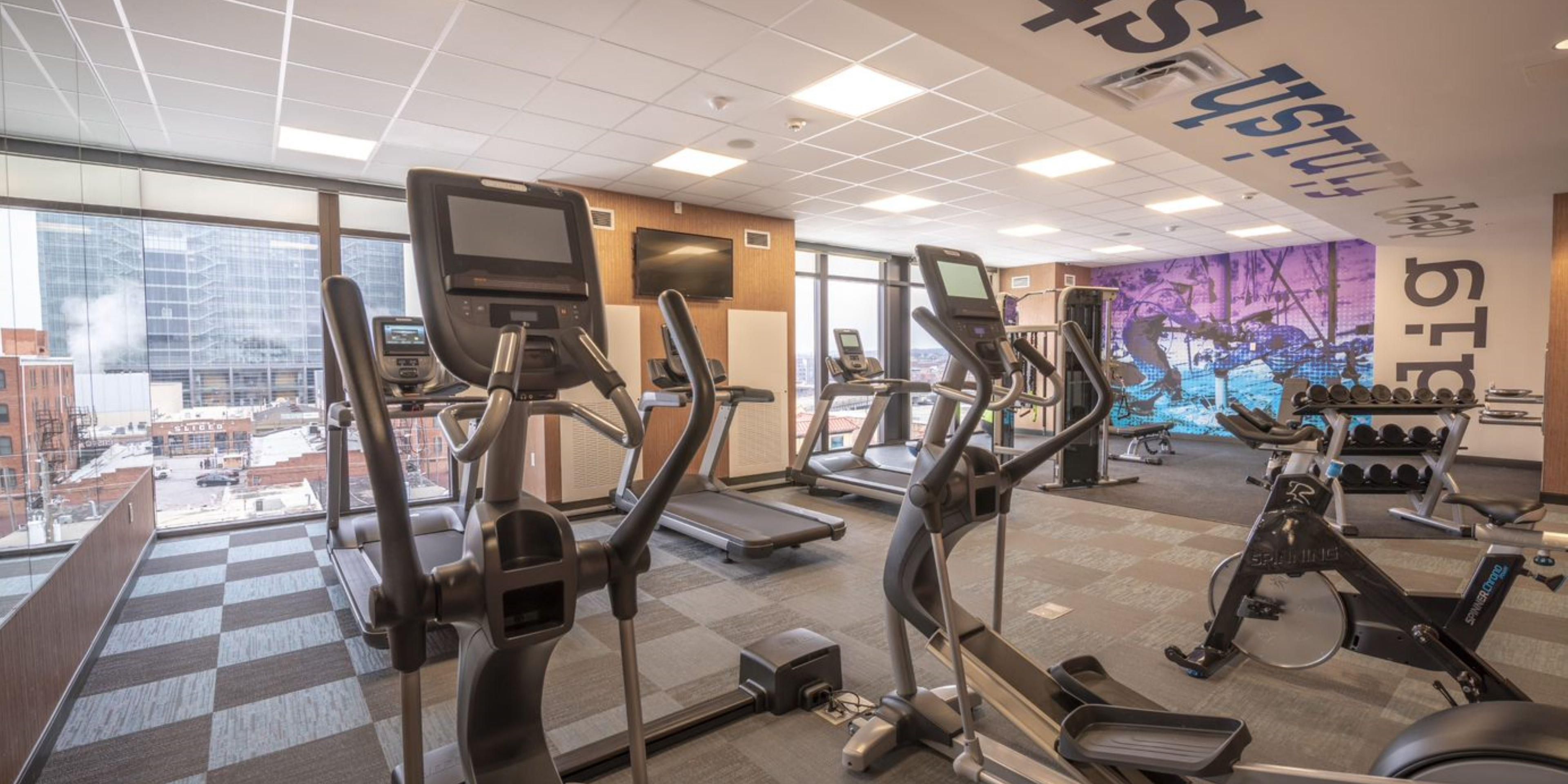 Fitness Center available 24/7 and has a great view of downtown