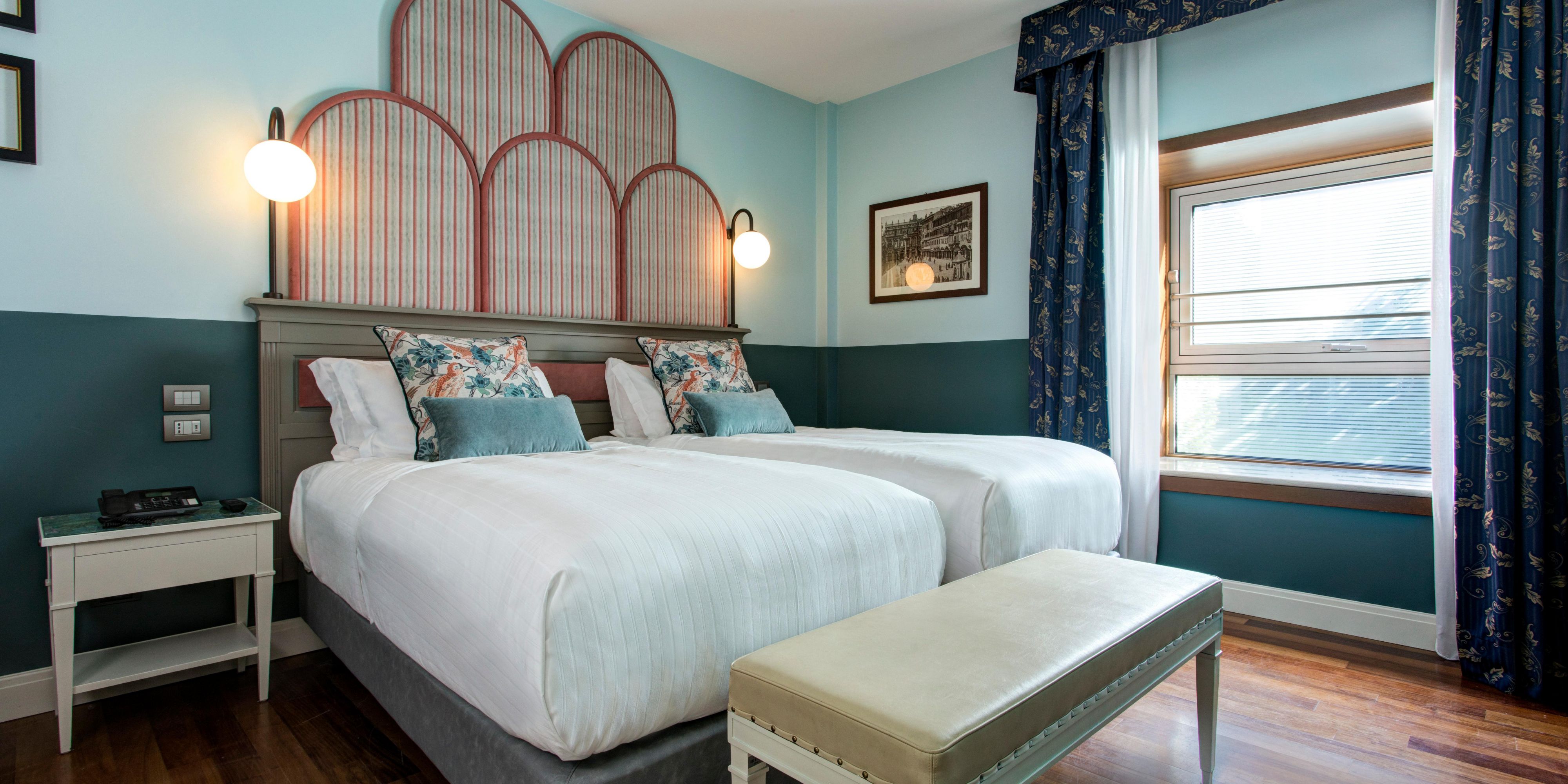 35sqm Suite with 2 plush twin beds, bathrobes and slippers.
