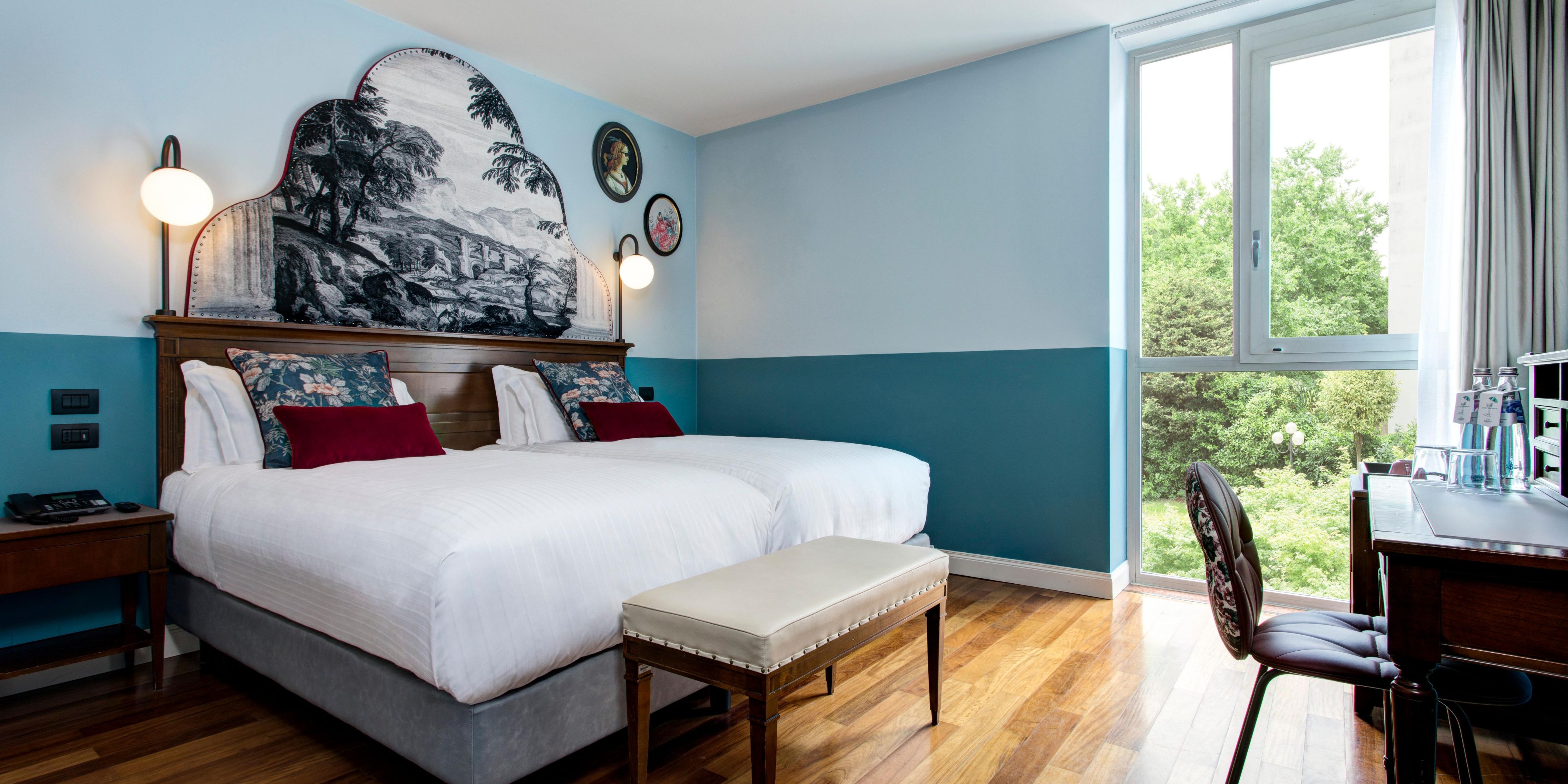Large & Stylish Premium Rooms.  Decorative pillows & items removed