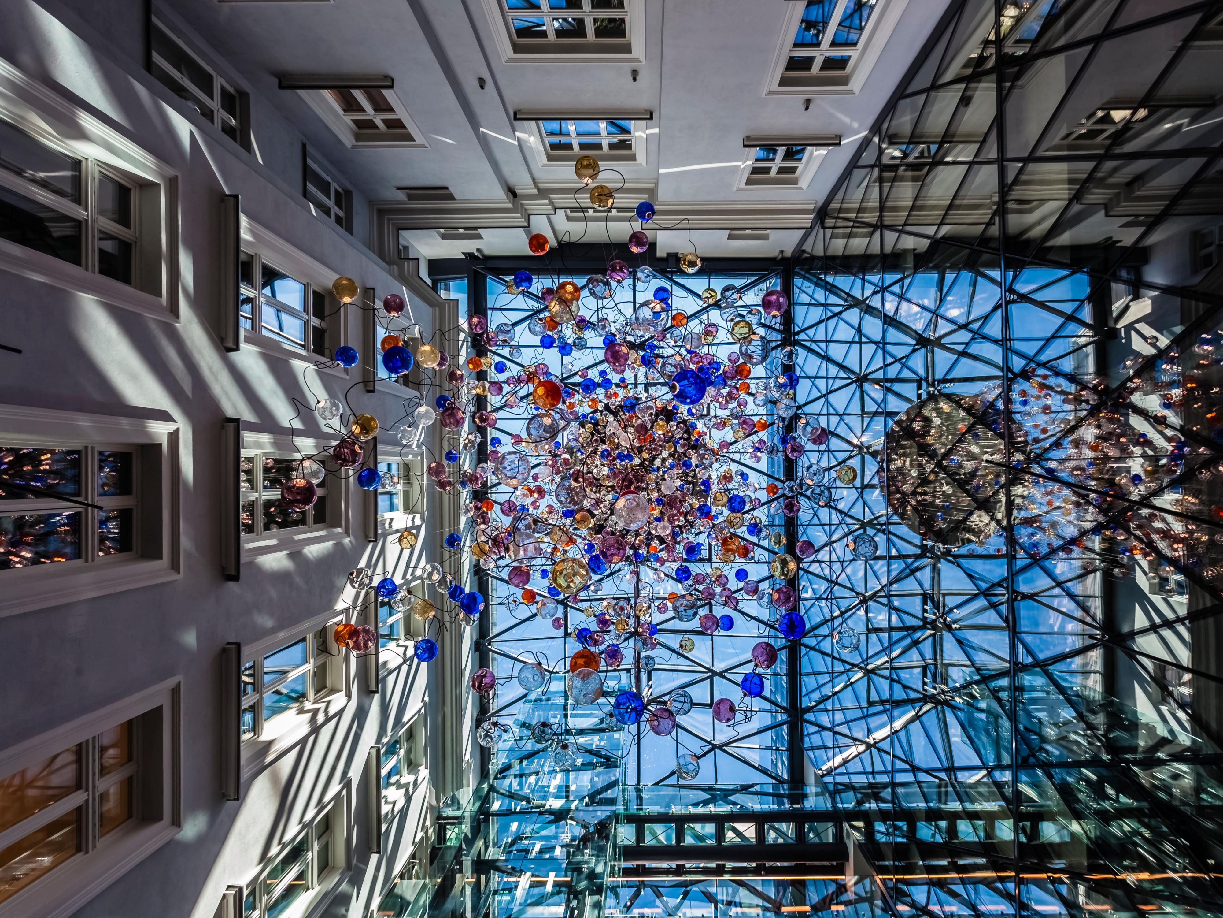 Look up and enjoy the beauty of our chandelier.