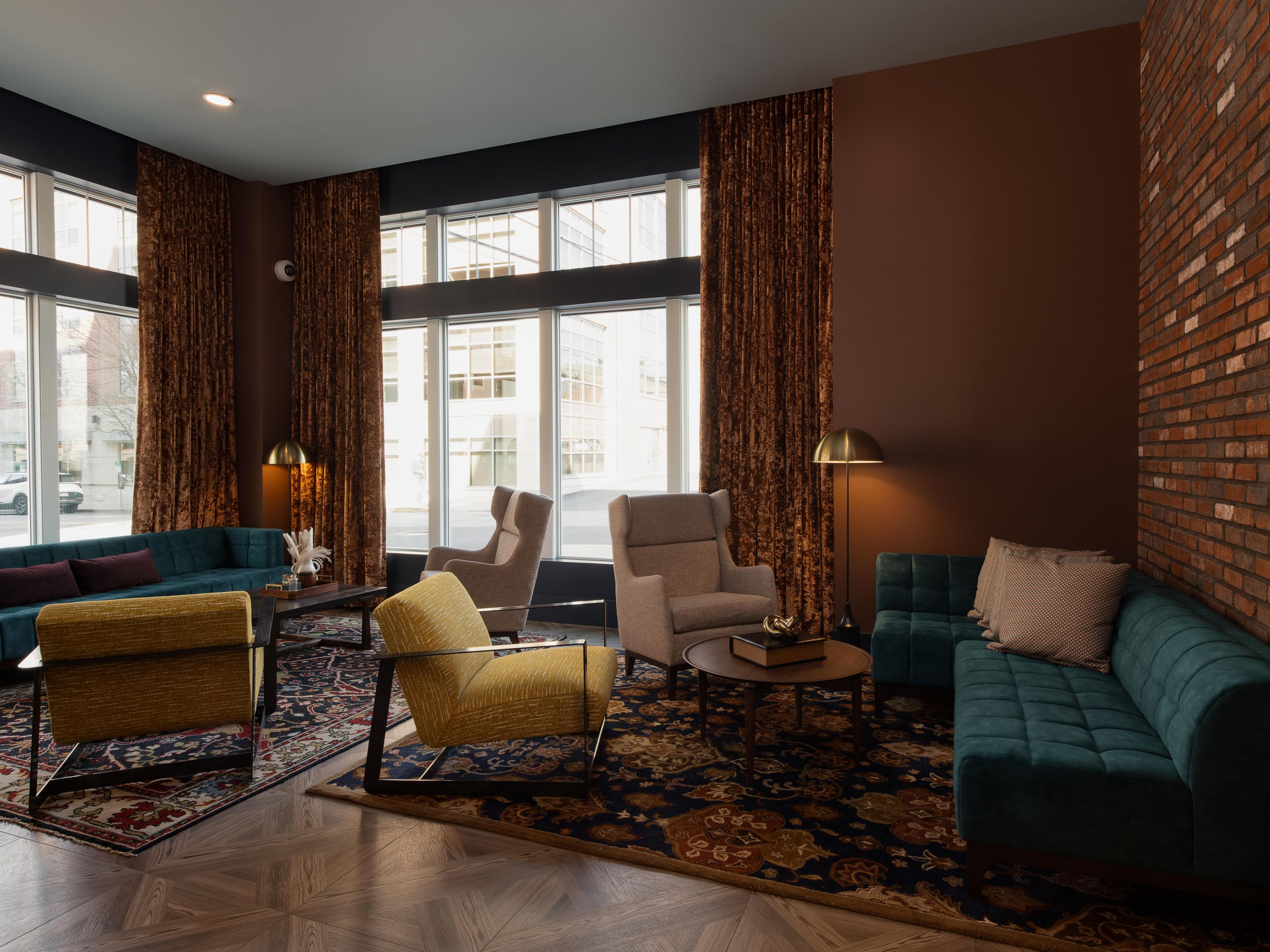 Step into the vibrant charm of our West Chester hotel lobby.