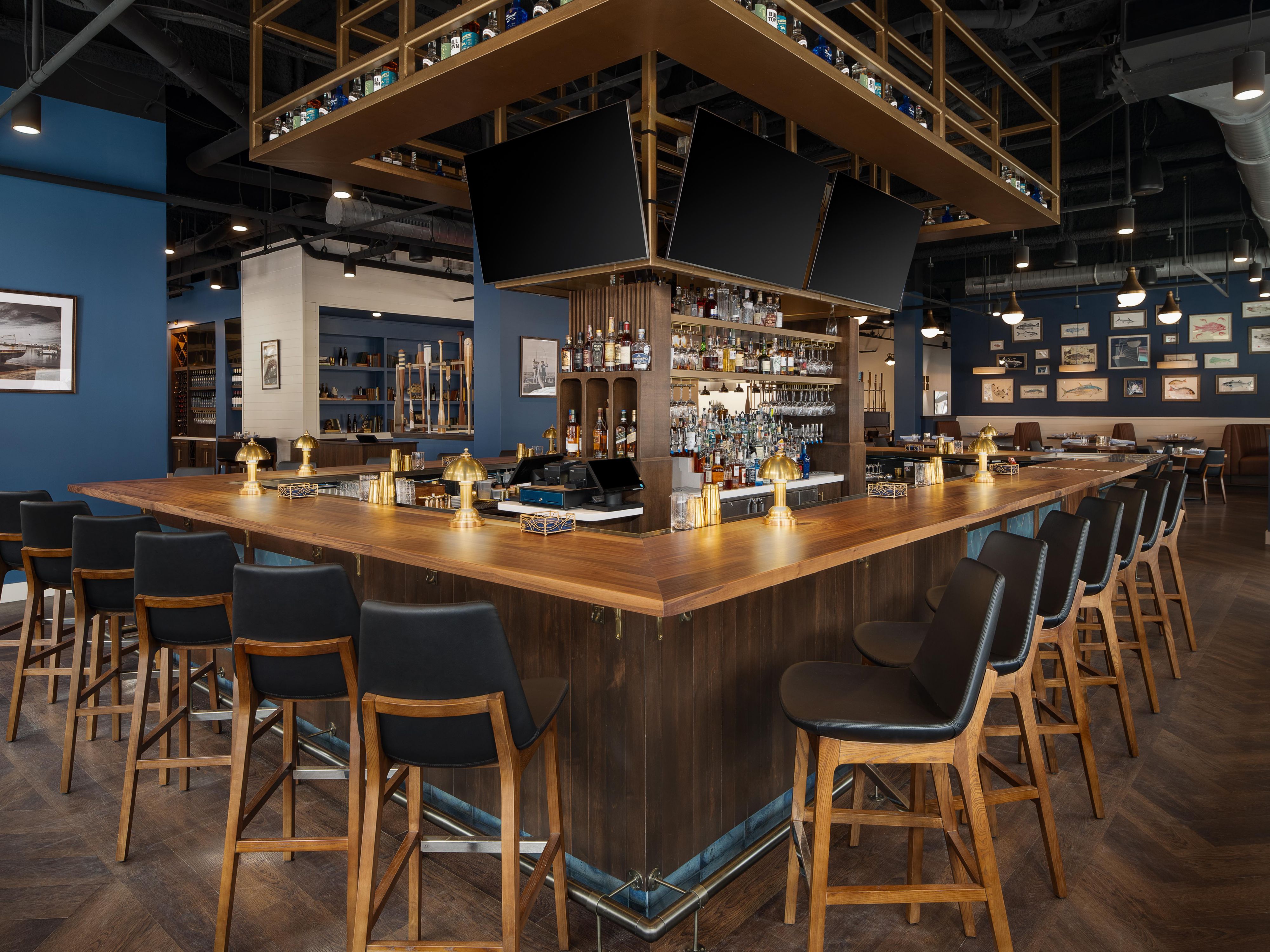Grab a drink at the bar at West Chester Seafood Kitchen.