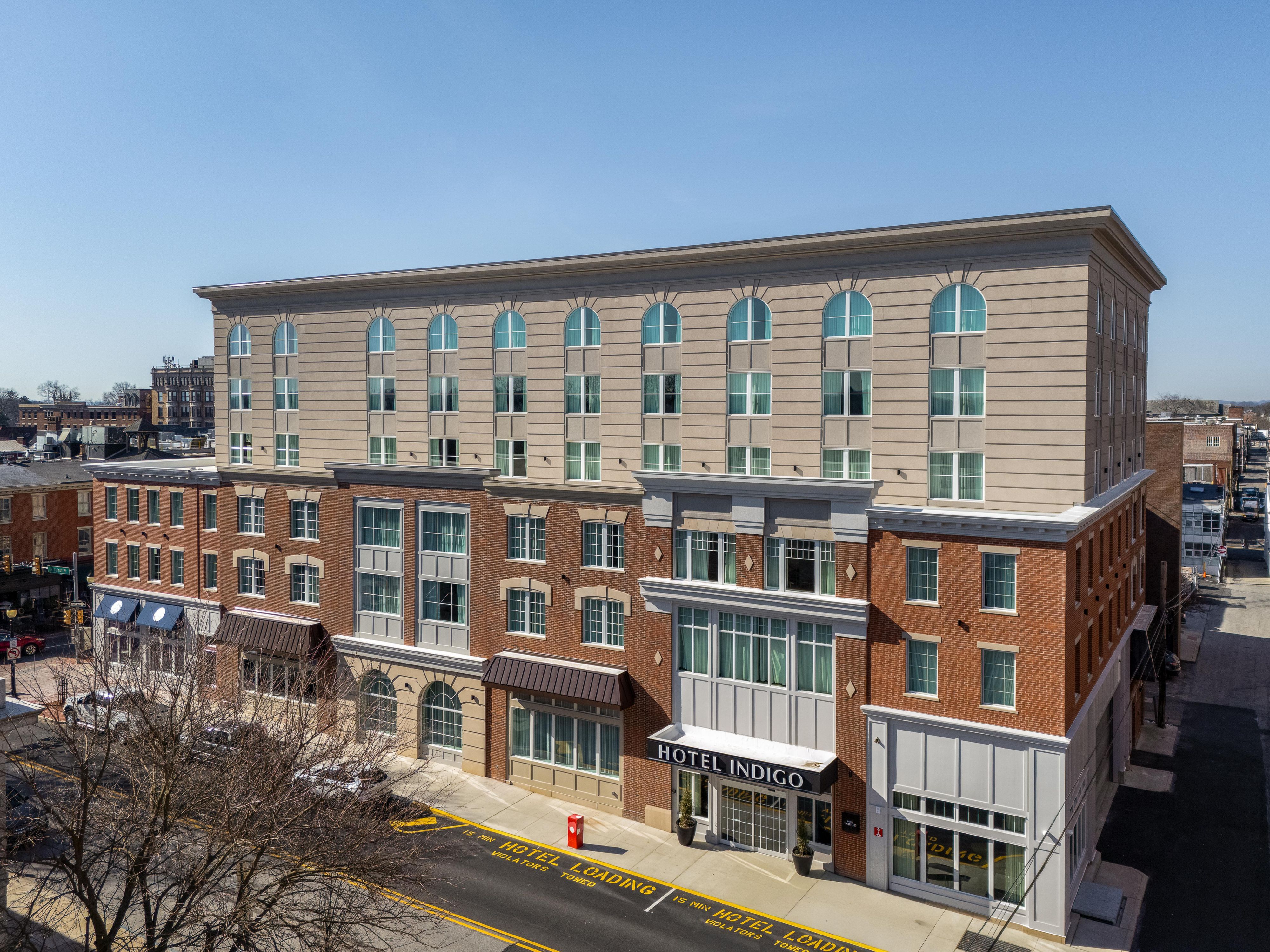 A view of the Hotel Indigo entrance on Walnut Street
