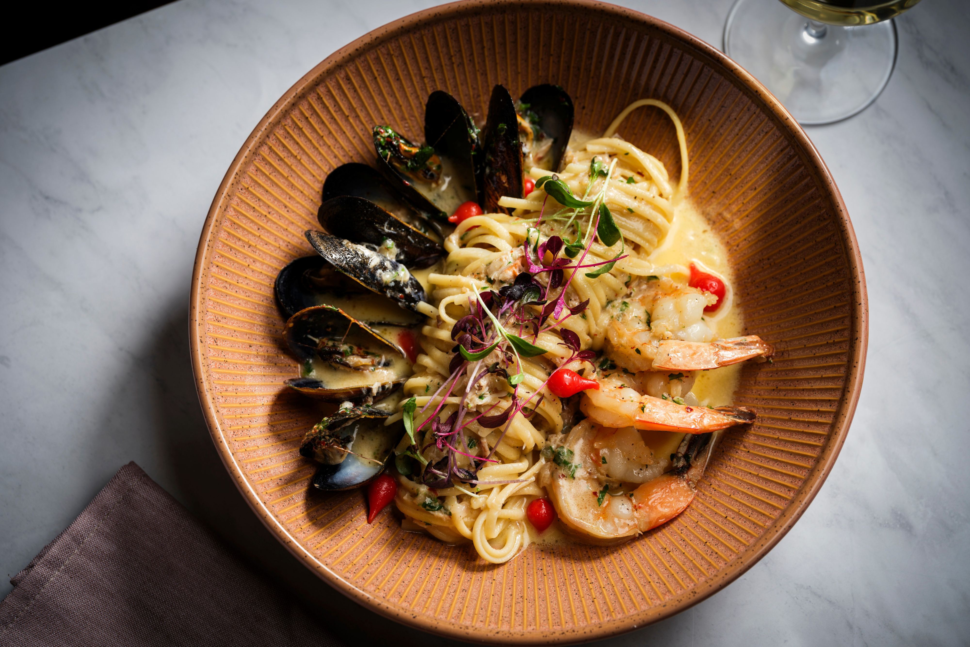 Seafood pasta with shrimp and mussels in creamy sauce