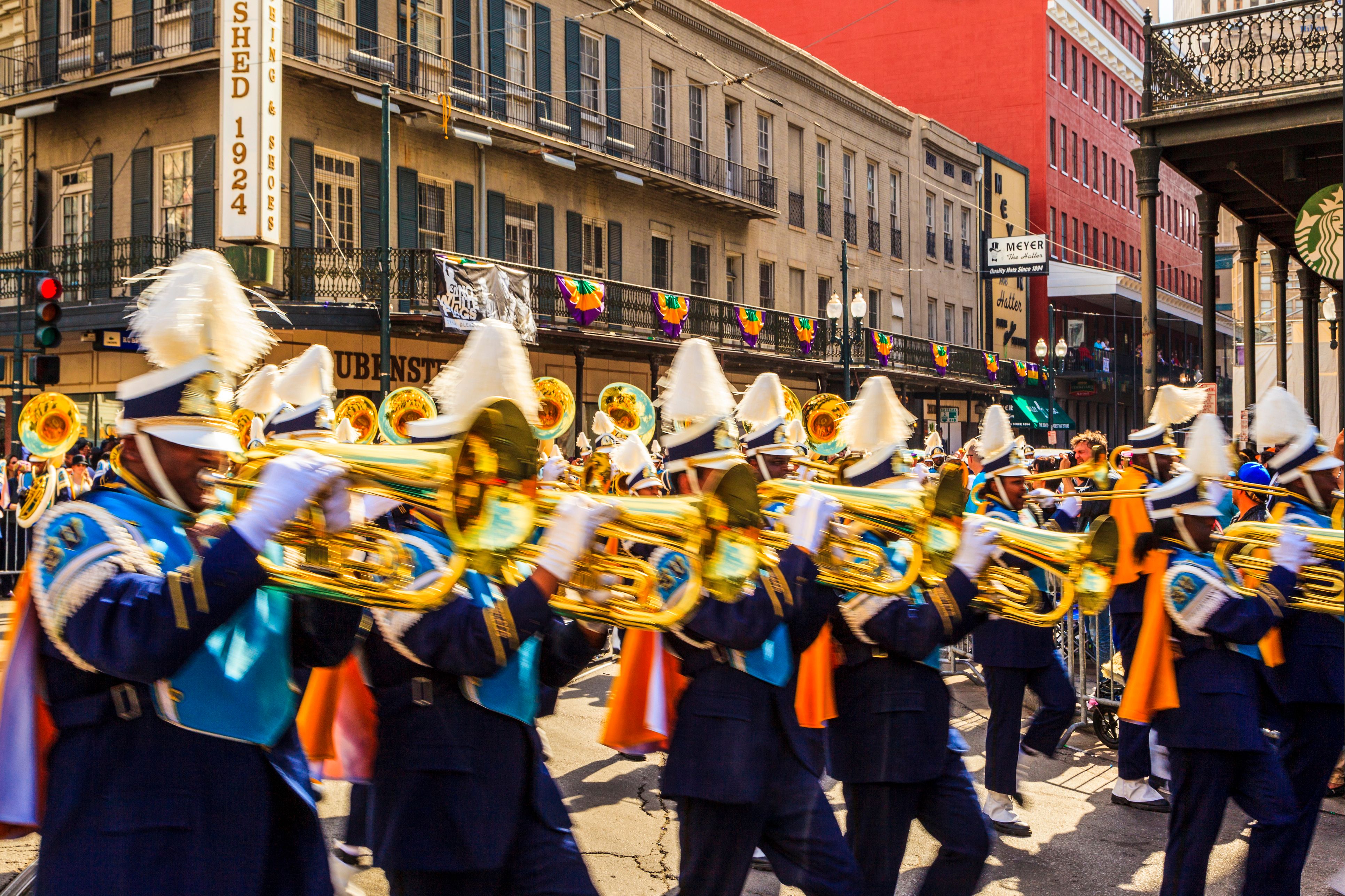 New Orleans USA Feb 1, 2016: Mardi Gras parades - St. Katharine Drexel Preparatory S. - through the streets of New Orleans. People celebrated crazily. Mardi Gras is the biggest celebration the city of New Orleans hosts every year.