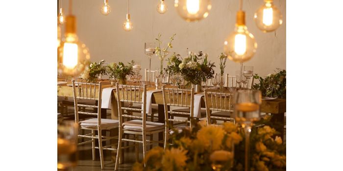 Floral bouquet on a table set for a wedding