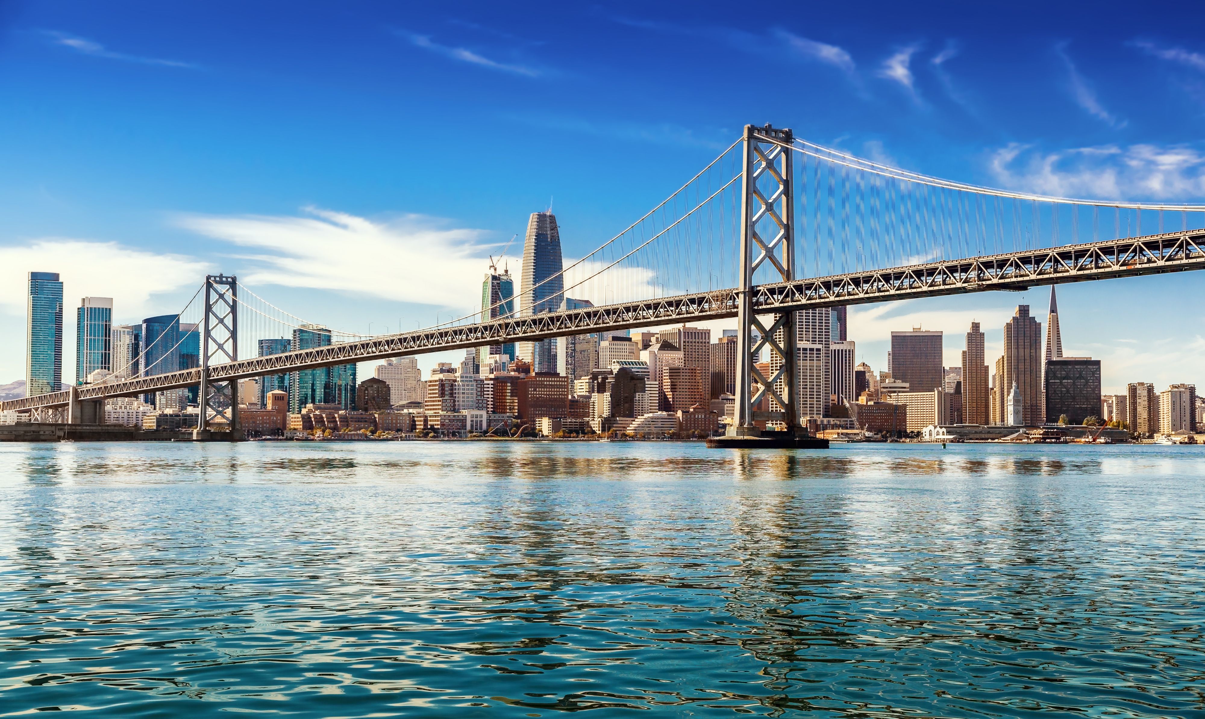 Downtown San Francisco and Oakland Bay Bridge on sunny day