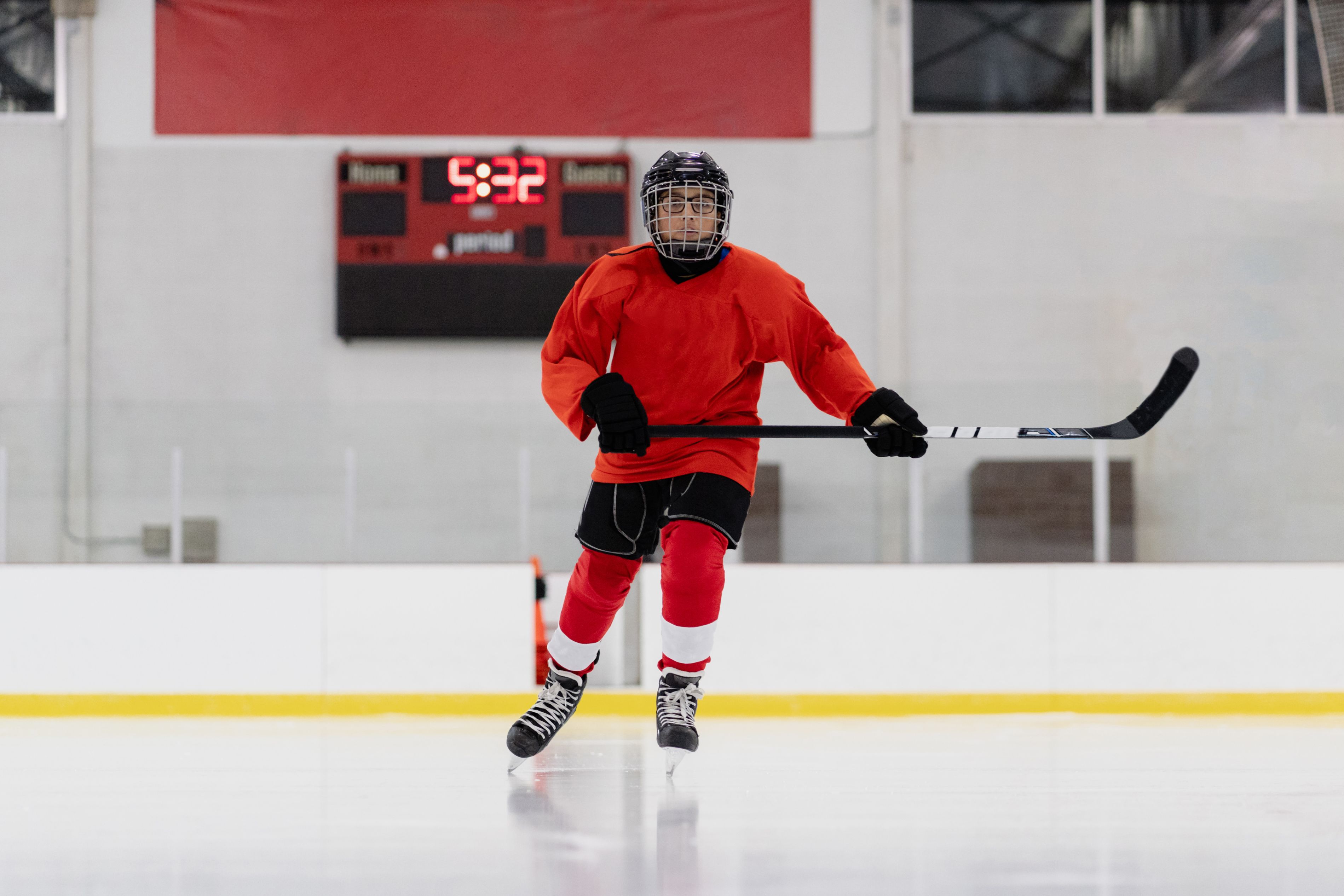 Hockey player on the ice rink