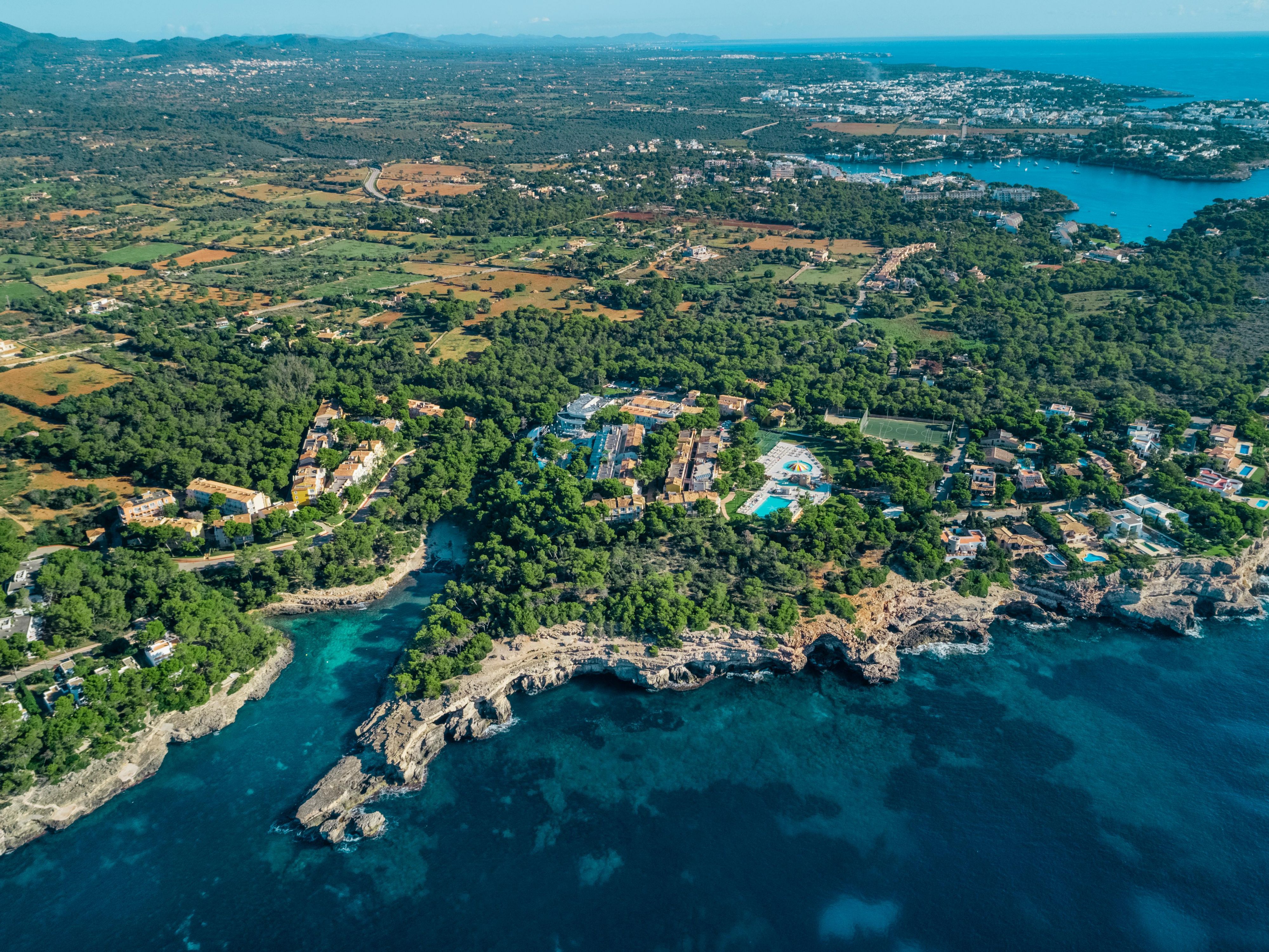 The beach lies just metres away, at Cala Barca Trencada, or explore the captivating island of Majorca with a trip to the Mondragó Nature Reserve, less than five minutes away, to follow one of the family hiking routes that take you through white sandy coves and Mediterranean pine forests.