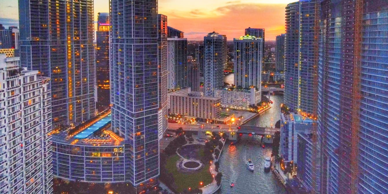 Sun setting amidts the sky scrapers in downtown Miami
