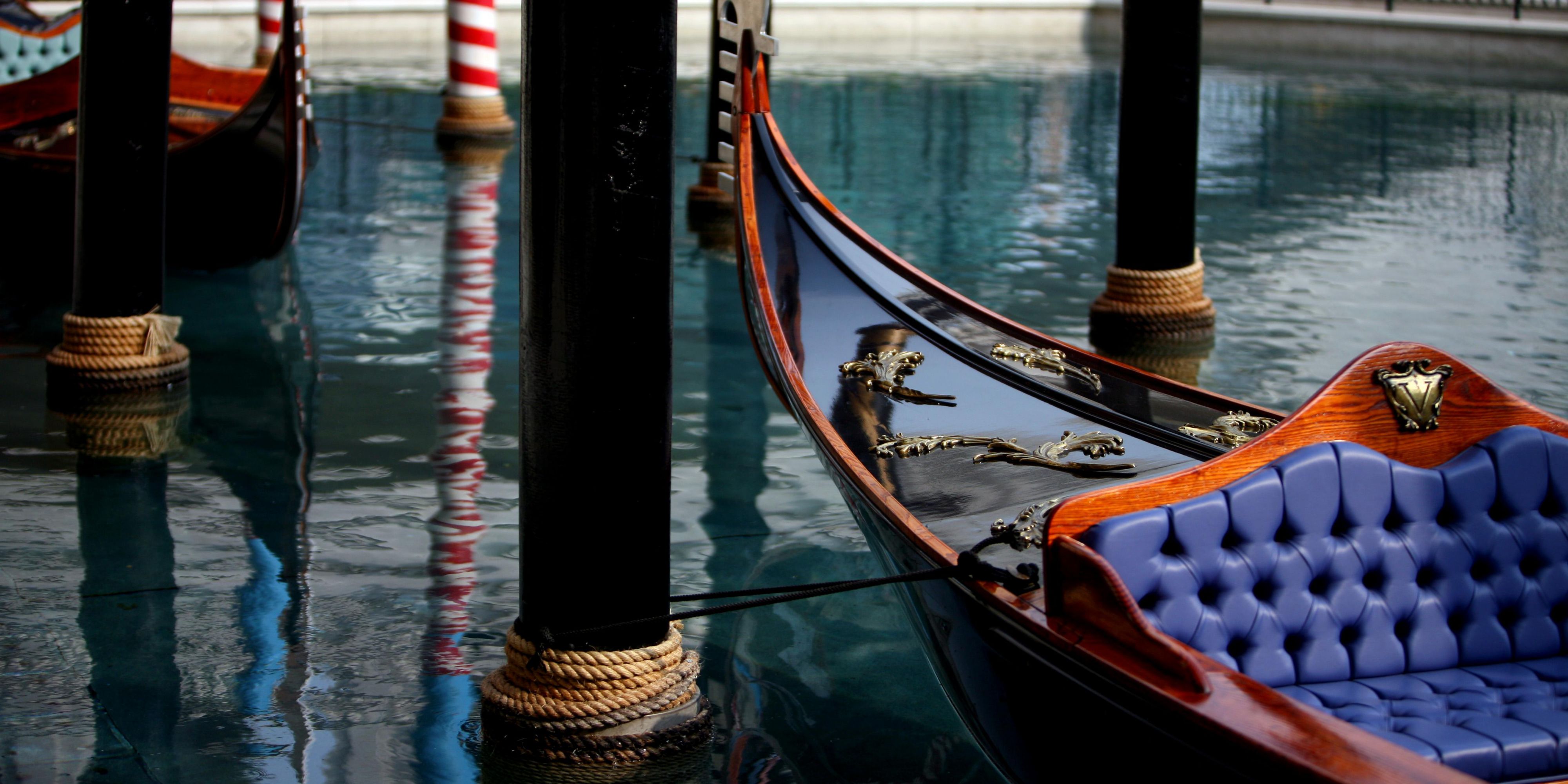 Guests can experience an entertaining voyage through the indoor canals on an Italian gondola, with singing gondoliers serenading them as they wind their way through the canals of Shoppes at Venetian.