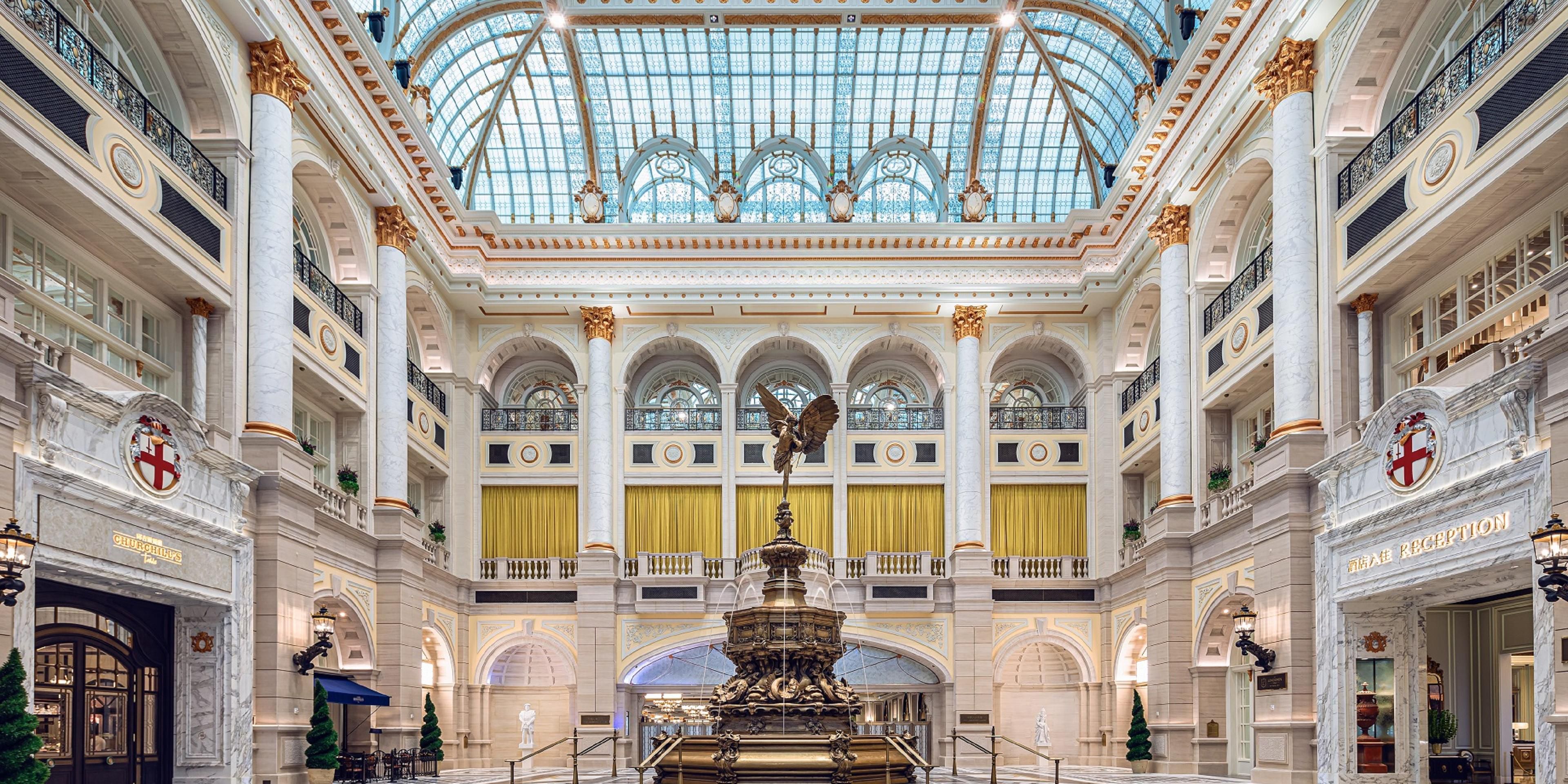 Guests enter The Londoner Macao through the magnificent glass-canopied Porte Cochere designed after historic Victoria Station, before arriving at the Crystal Palace, a spectacular space at the heart of the integrated resort.