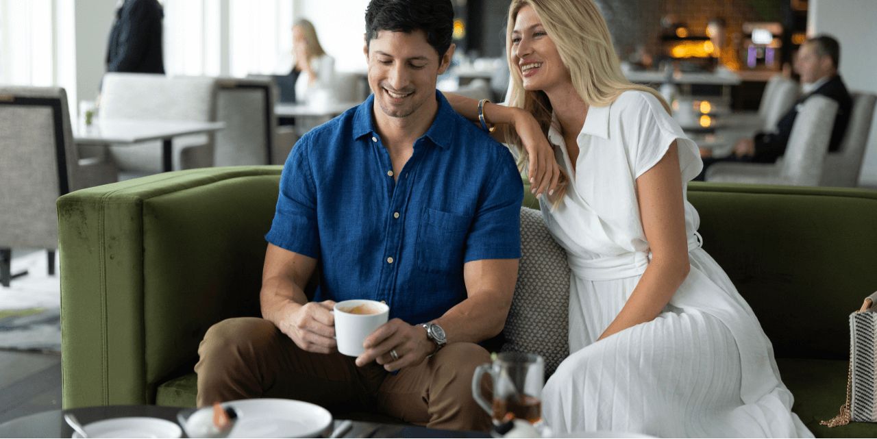 Couple sitting enjoying coffee