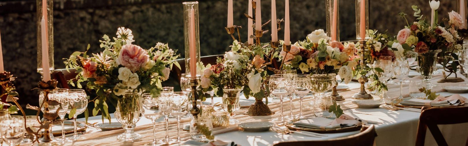 long table with glamorous formal table setting