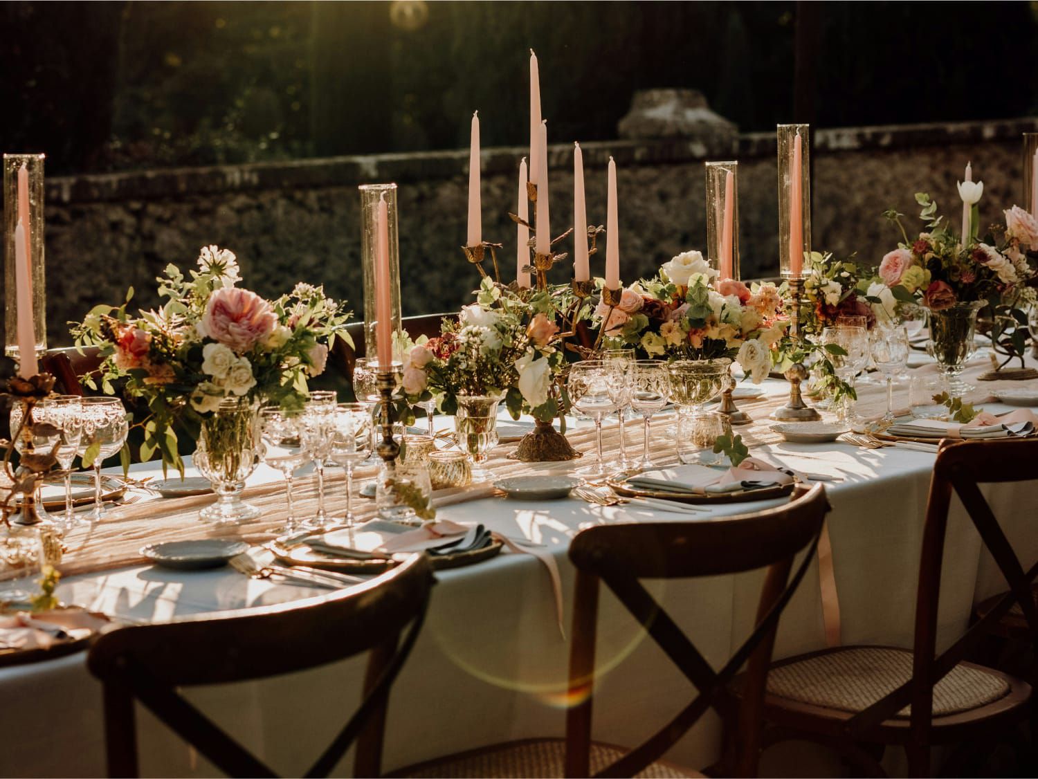 long table with glamorous formal table setting