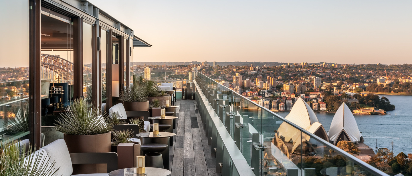 Outdoor porch with stone seating area