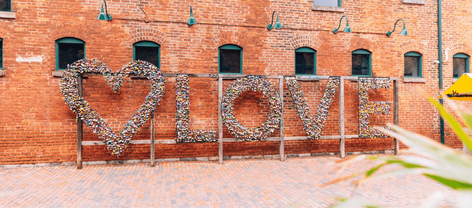 Brick toronto sign that says love