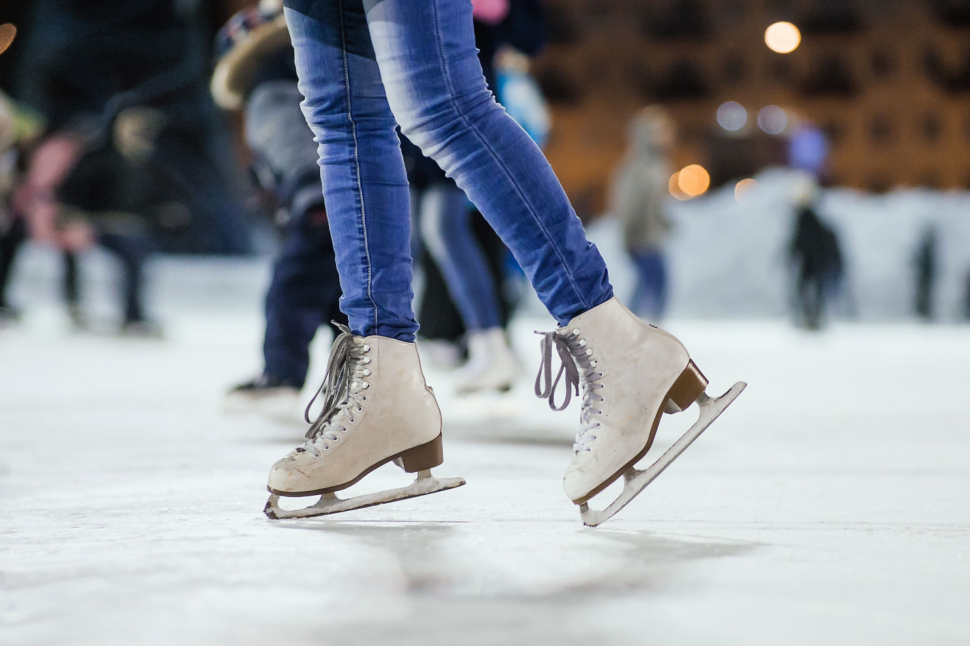 Close up of ice skater on the rink.
