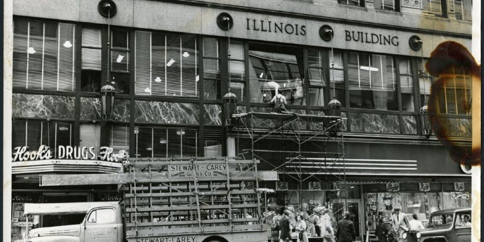 Historic shot of Hooks Drugstore next to Illinois Building.