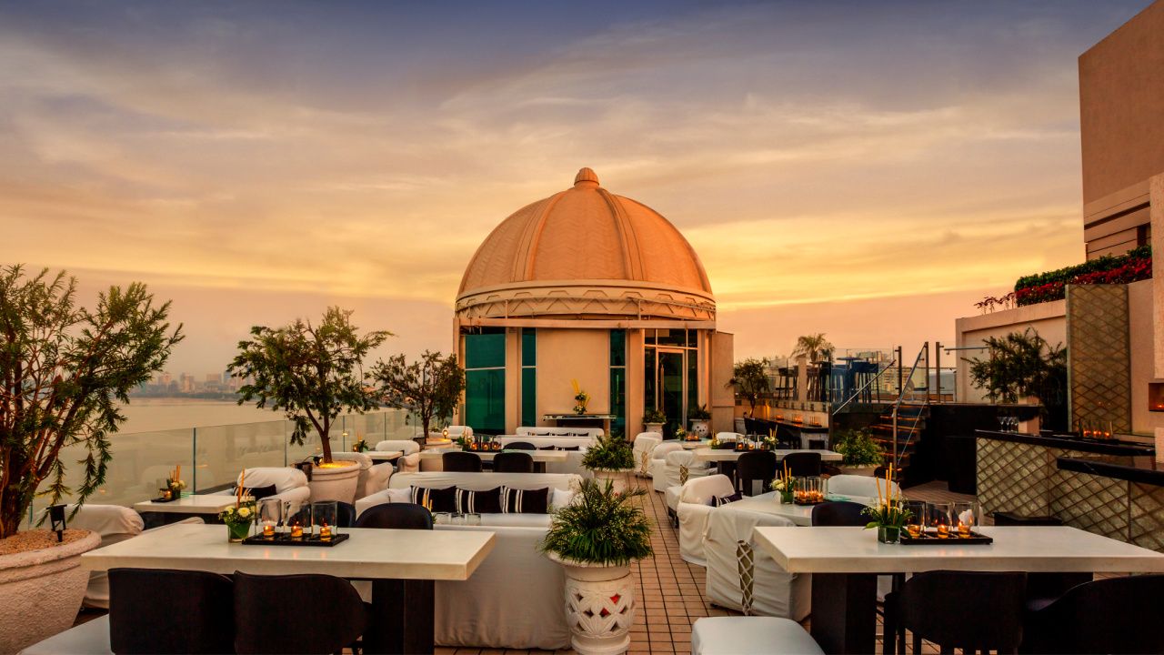 rooftop terrace overlooking dramatic city scene in mumbai