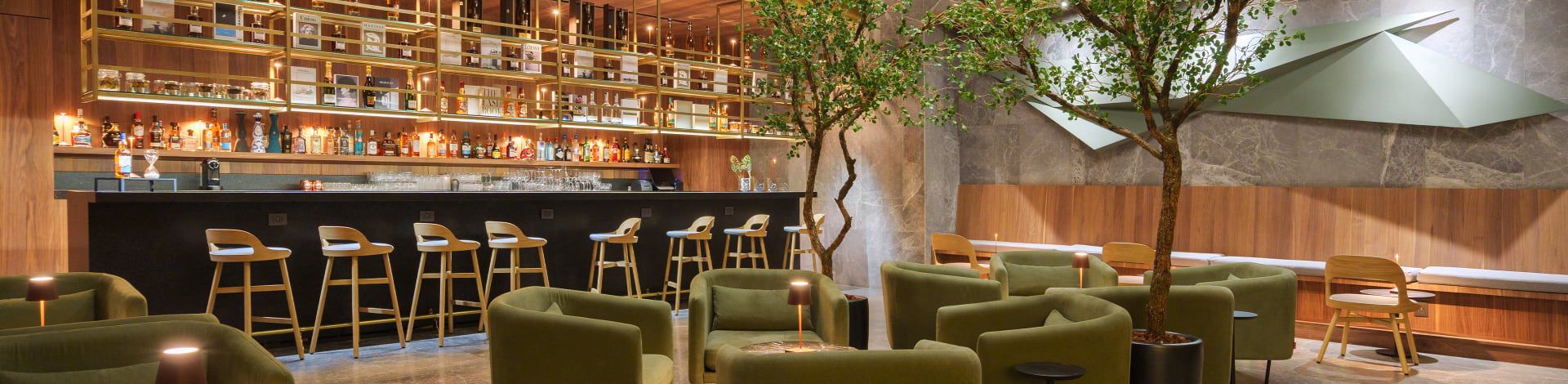 Contemporary hotel lounge with bar and seating area