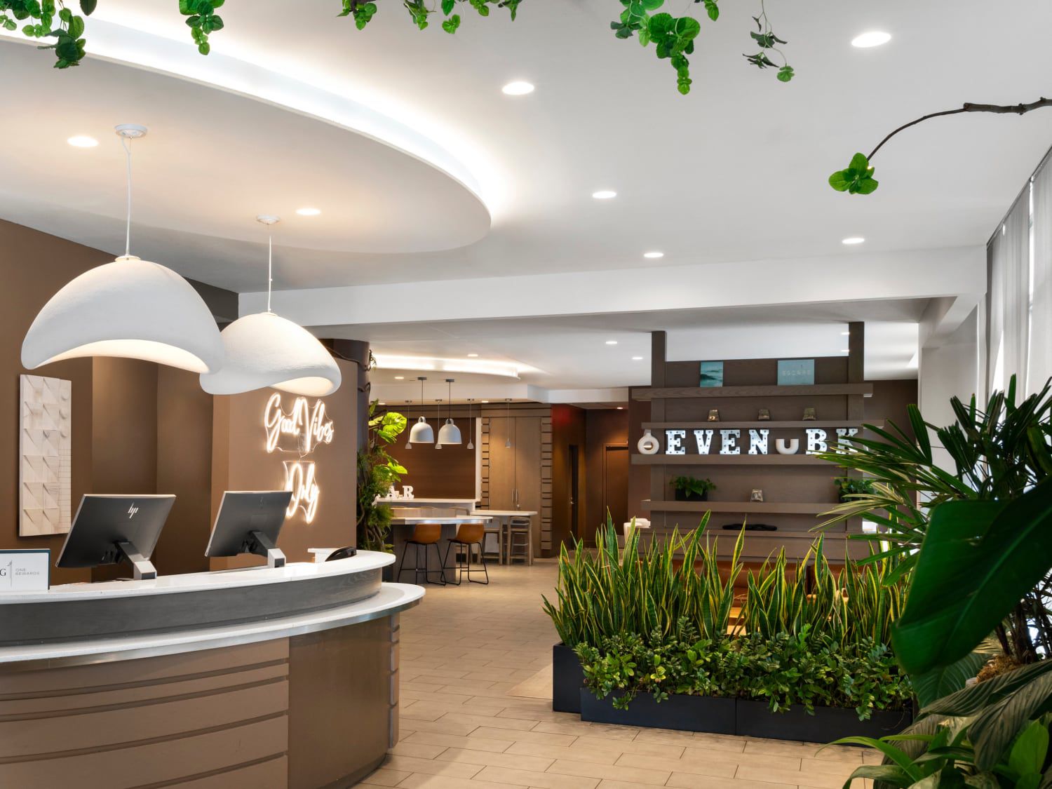 Hotel lobby with reception desk and lounge seating