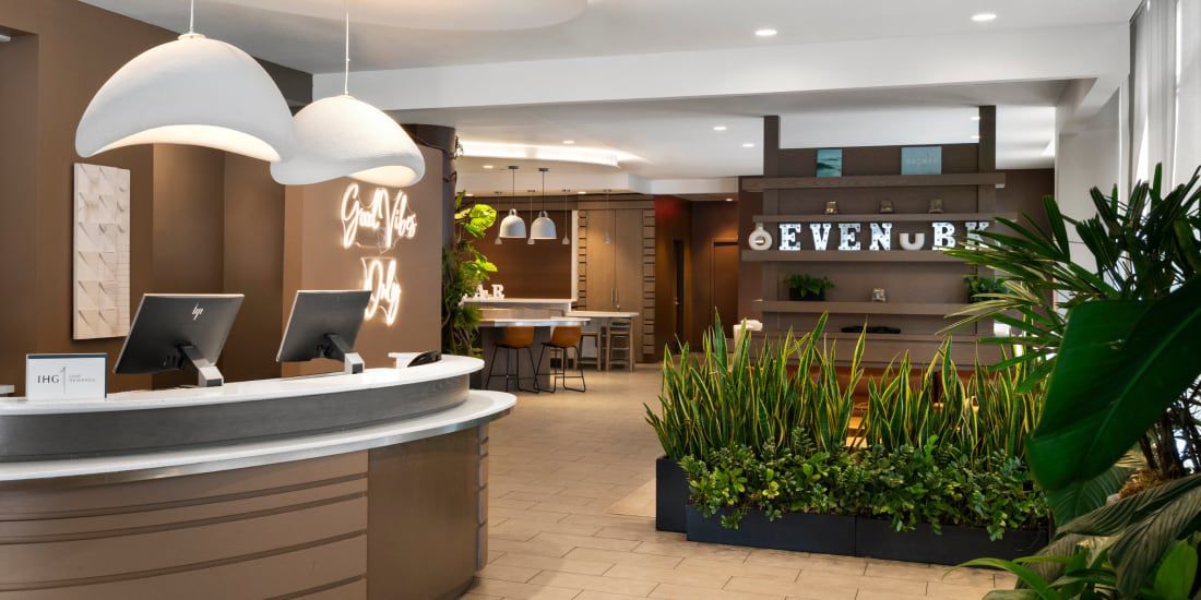 hotel lobby with reception desk and lounge seating