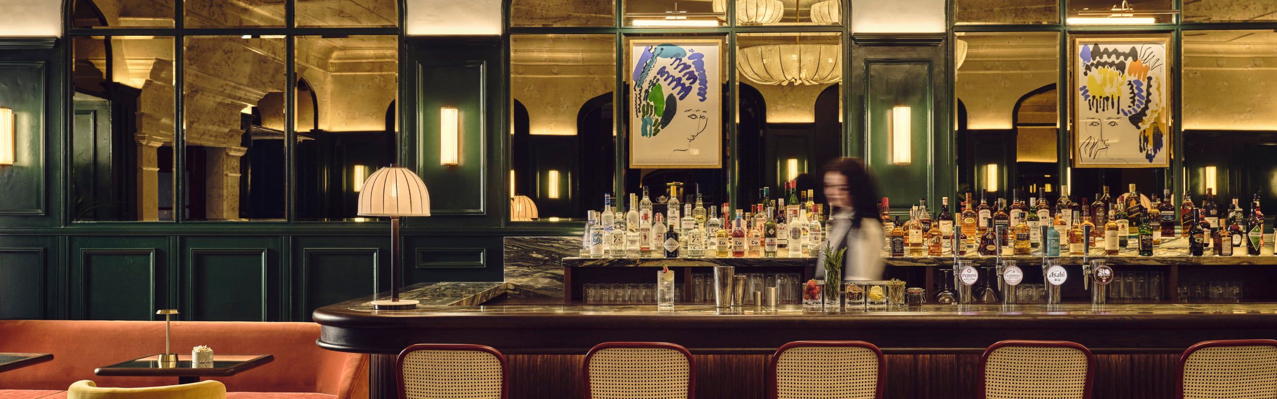bar area with seating with mirrored wall