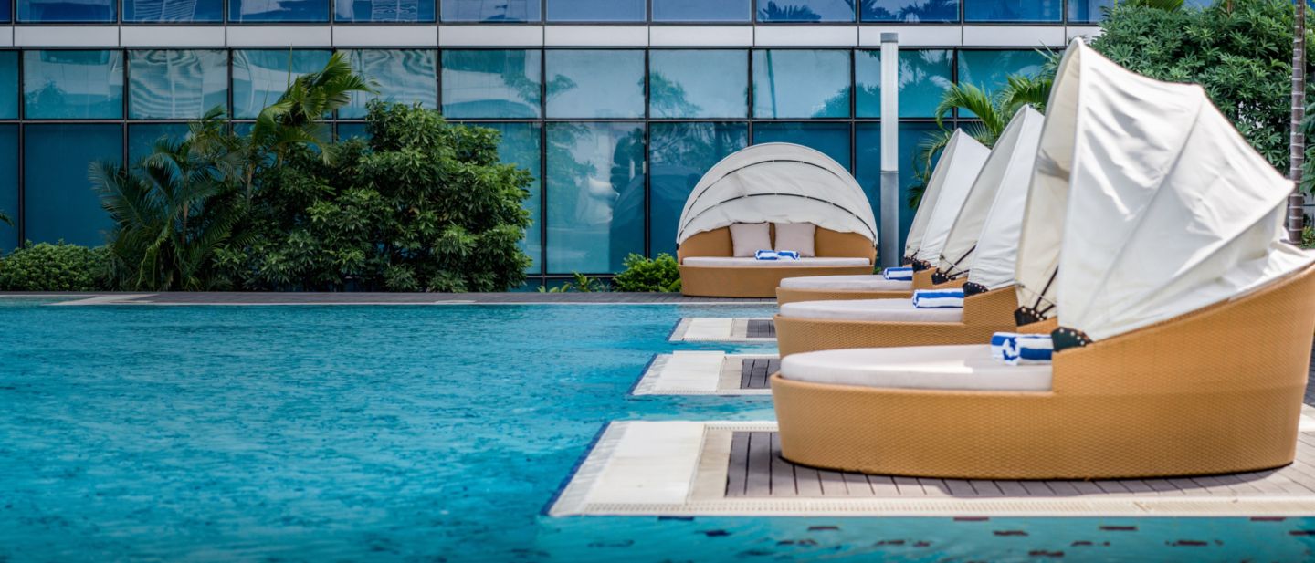 Side view of line of private pool cabanas
