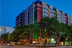 A beautiful corner shot of a hotel in Ottawa at night