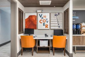 A hip and modern image of the business centre in an IHG hotel in Vancouver