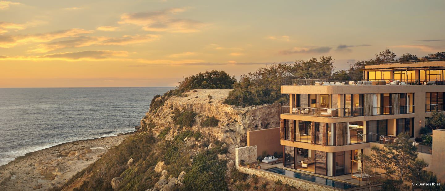six senses in ibiza on cliffside overlooking the ocean at dusk