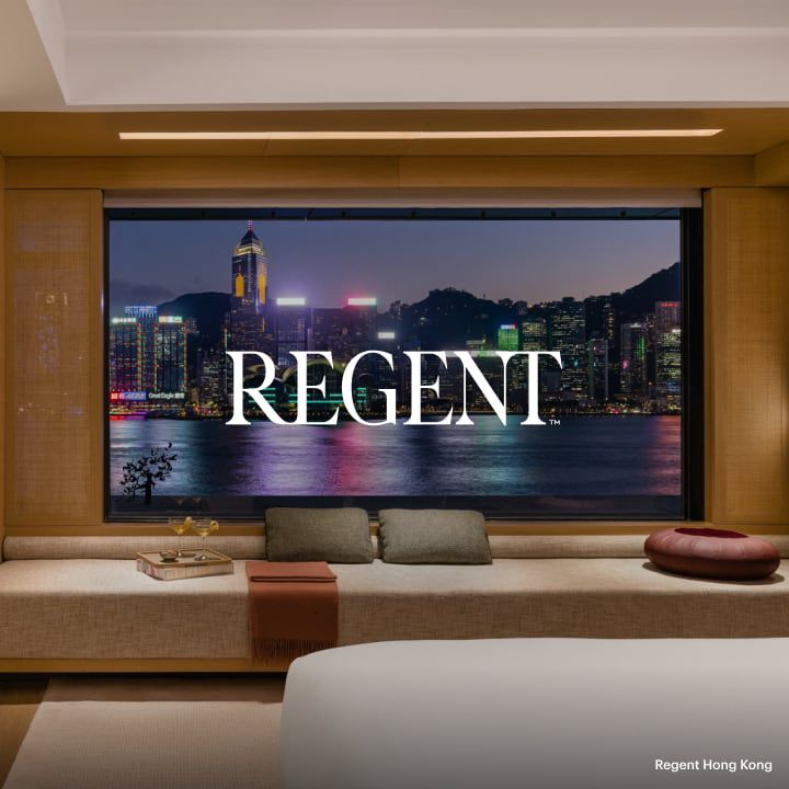 regent hong kong guestroom overlooking the water and city