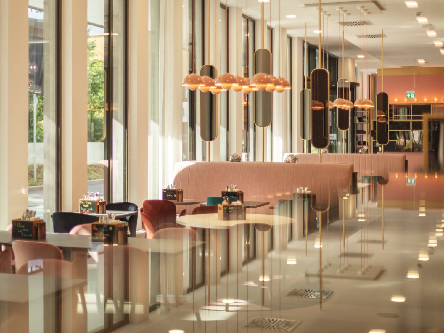 Softly lit dining area at Holiday Inn - the niu, Loco Munich North
