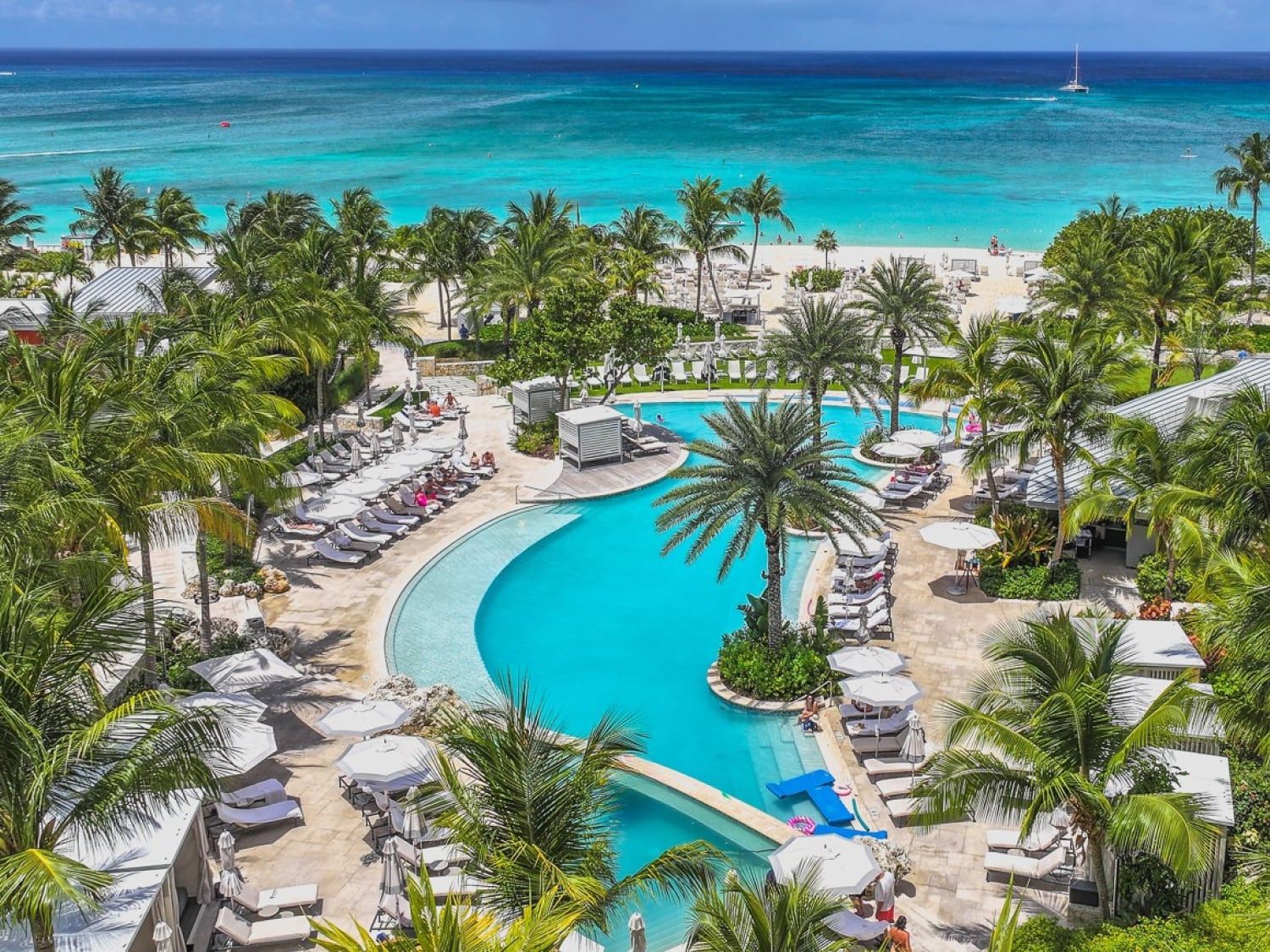Aerial view of the oceanfront pool at Kimpton Seafire Resort + Spa