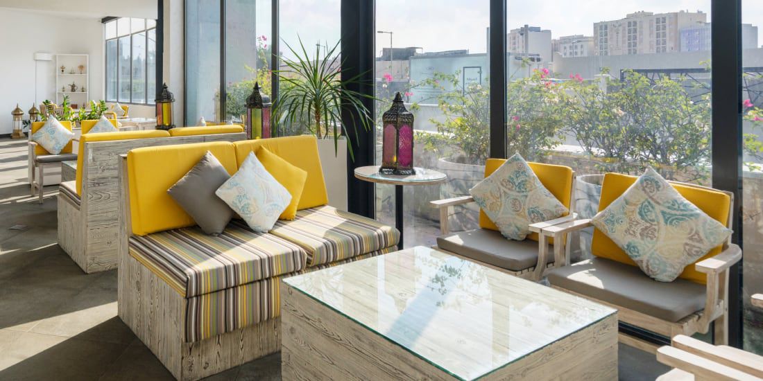 Light-filled sitting area at Crowne Plaza Doha – The Business Park