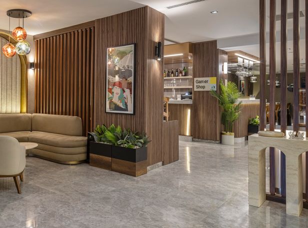 Cozy seating and a stocked shop await in the lobby of Garner Hotel Istanbul – Airport Arnavutkoy.
