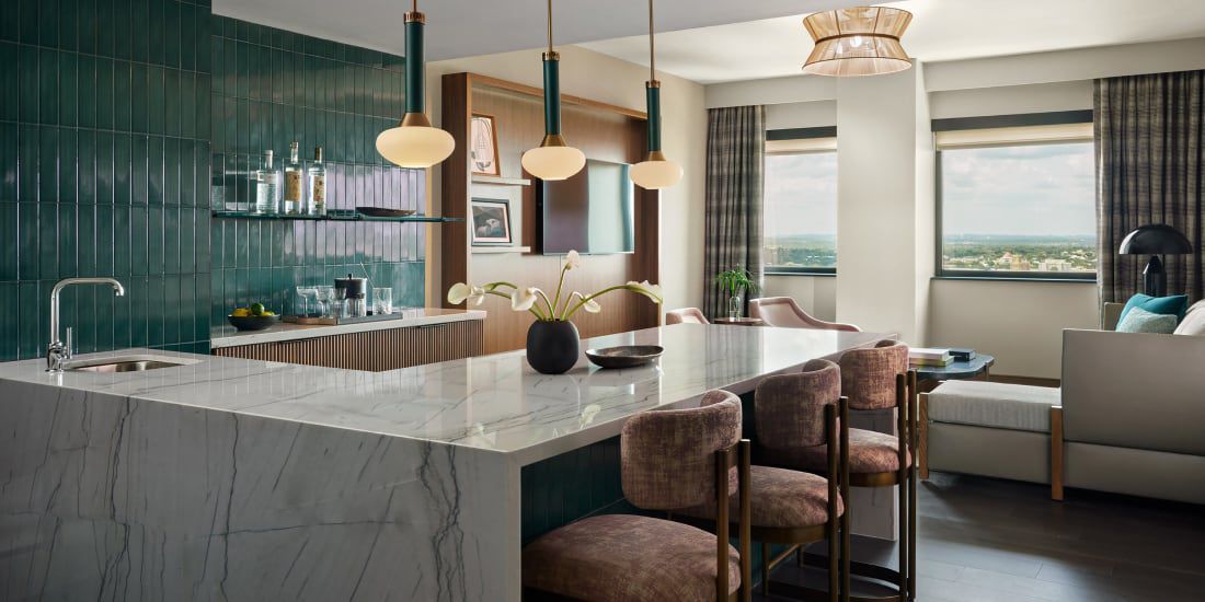 The elegant kitchen area of the one-bedroom suite at InterContinental San Antonio Riverwalk.