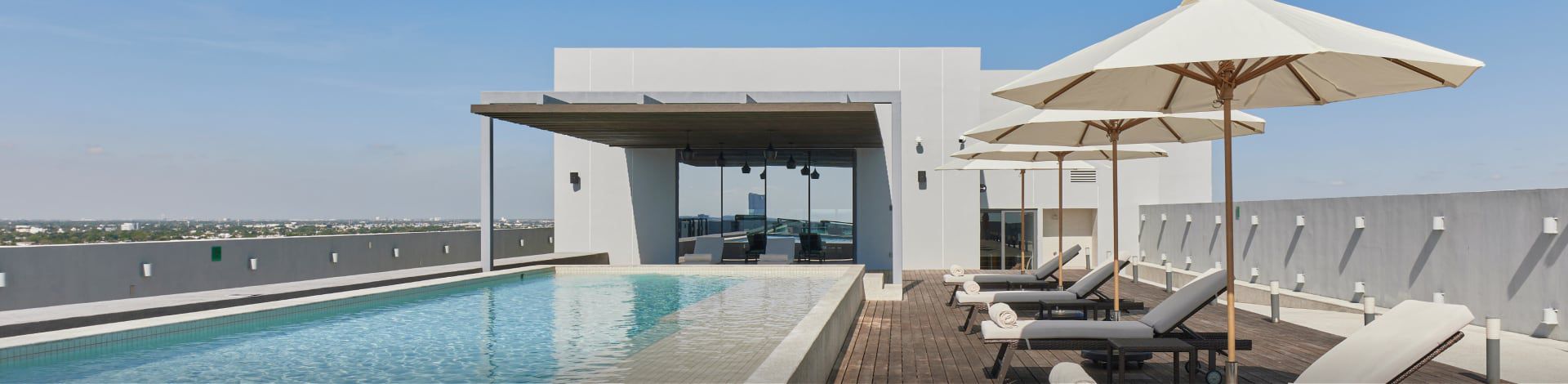 The sparkling rooftop pool overlooks the city at Crowne Plaza Merida.